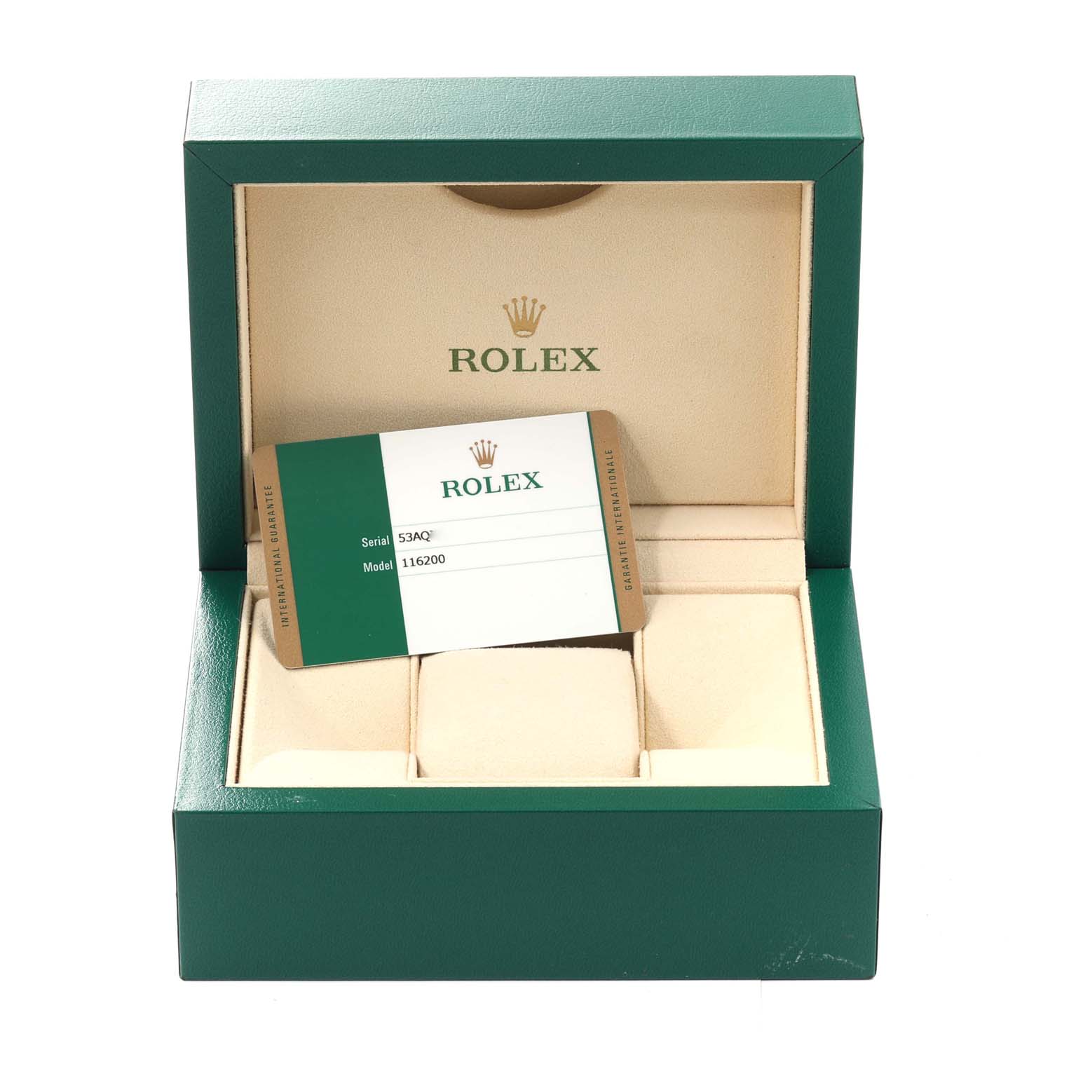 The image shows an open Rolex green box for the Datejust model, with a warranty card inside the box.