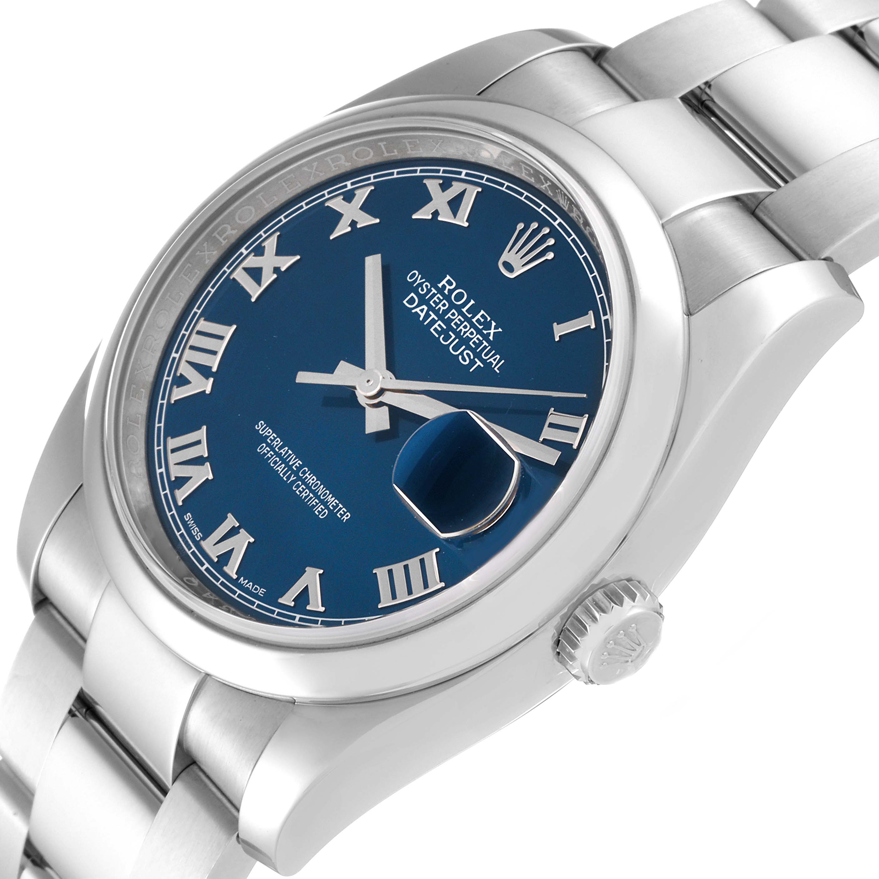 The image shows a close-up angle of a Rolex Datejust 116200 Men's Stainless Steel Blue Dial 116200 Men's Stainless Steel Blue Dial, focusing on its blue dial, Roman numerals, crown, and part of the bracelet.