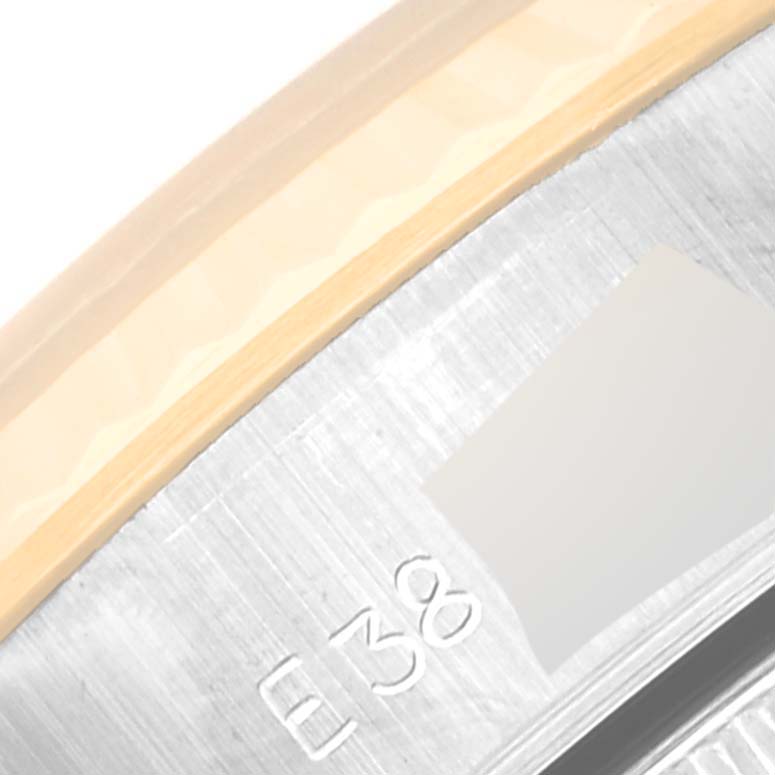 The image shows a close-up of the caseback edge with markings, "E 38", of a Rolex Datejust 69173 Women's Steel and Gold (two tone) Champagne Dial 69173 Women's Steel and Gold (two tone) Champagne Dial watch.