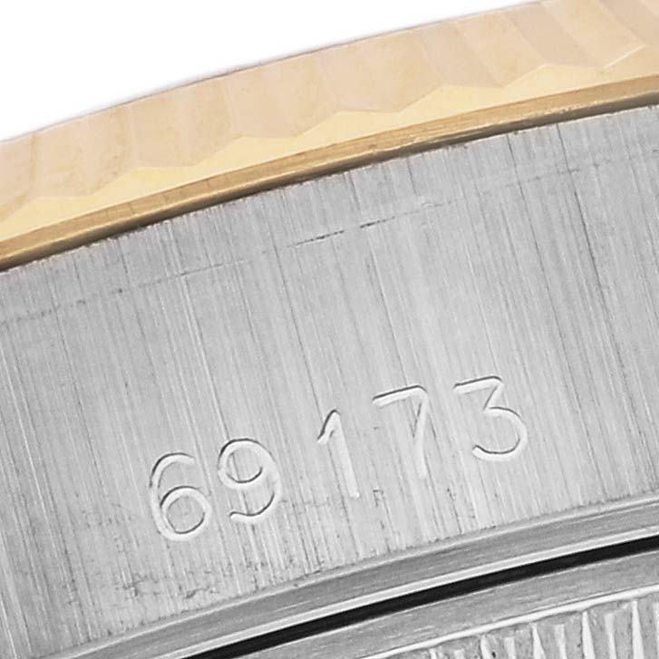This image shows a close-up of the model number 69173 on the side of a Rolex Datejust 69173 Women's Steel and Gold (two tone) White Dial 69173 Women's Steel and Gold (two tone) White Dial watch.
