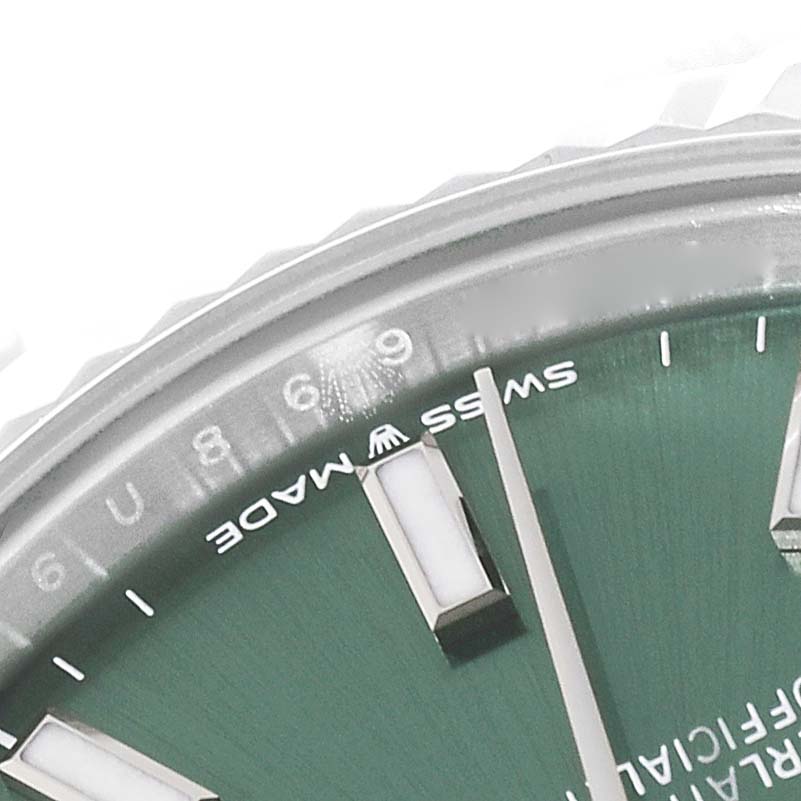 The image shows a close-up angle of the dial and bezel of a Rolex Mid-Size 278274 Women's Stainless Steel Green Dial 278274 Women's Stainless Steel Green Dial watch, highlighting the "Swiss Made" text.