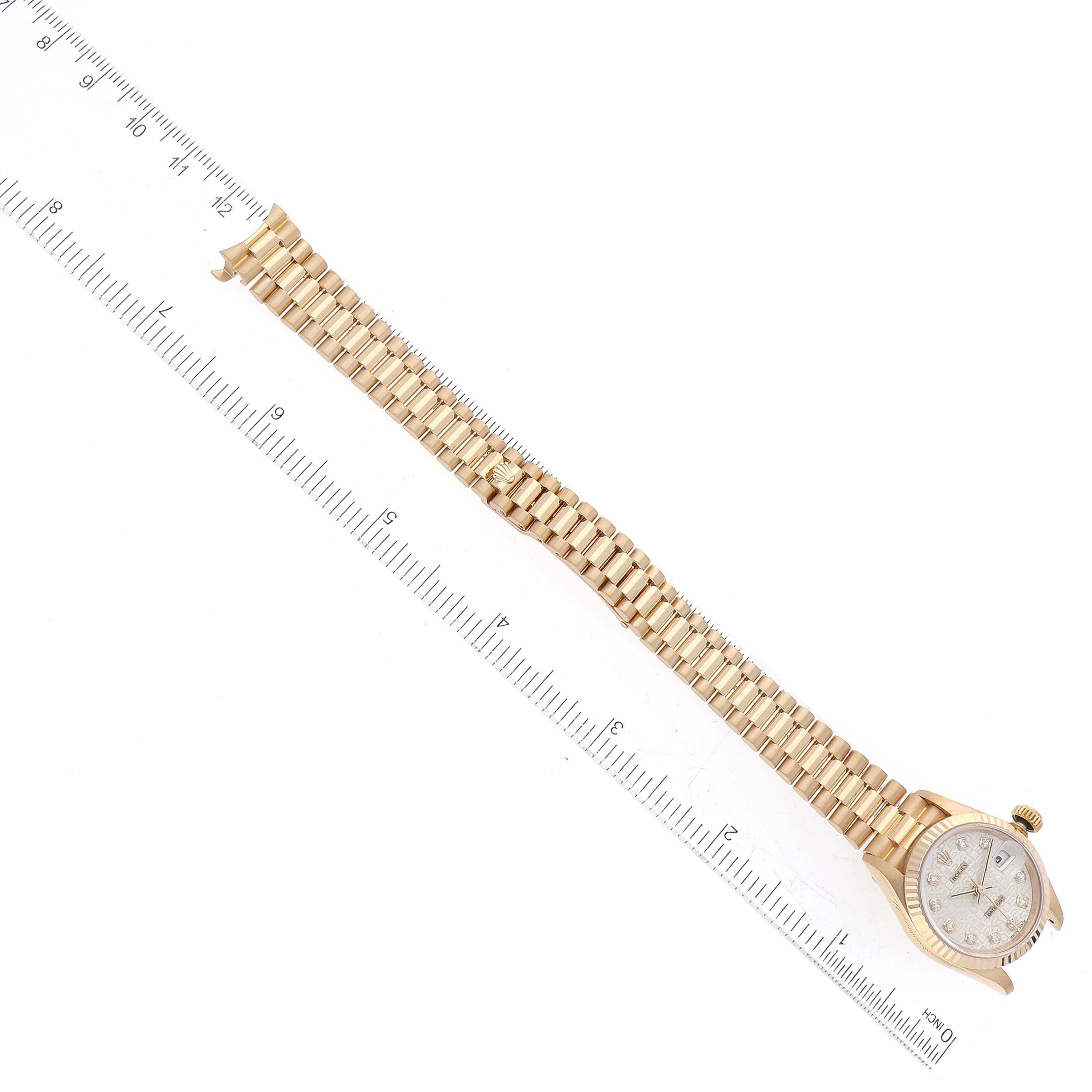 The Rolex President 69178 Women's Yellow Gold Silver Dial 69178 Women's Yellow Gold Silver Dial model watch is shown from a top-down angle, displaying the face, bezel, crown, and the entire bracelet.