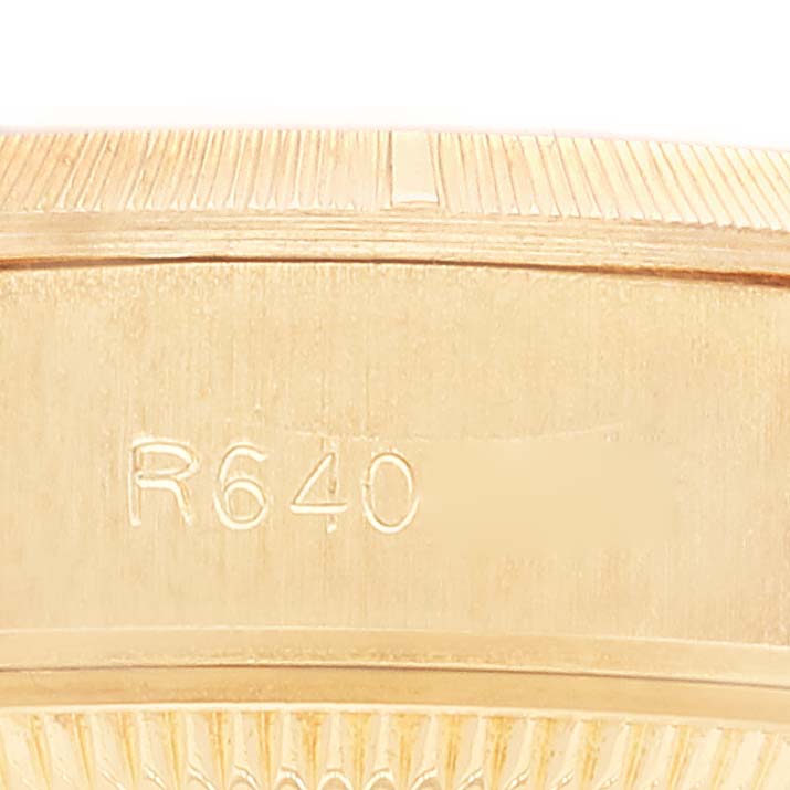 This is a close-up of the case back and edge of the President model by Rolex, showing the reference number "R640."