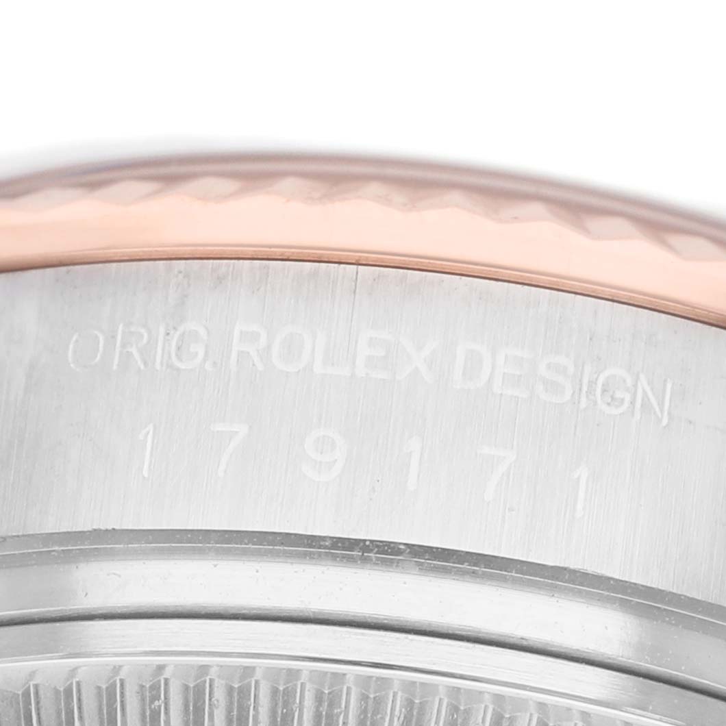 The image shows a close-up of the side of a Rolex Datejust 179171 Women's Steel and Gold (two tone) White Dial, highlighting the model number and bezel design.