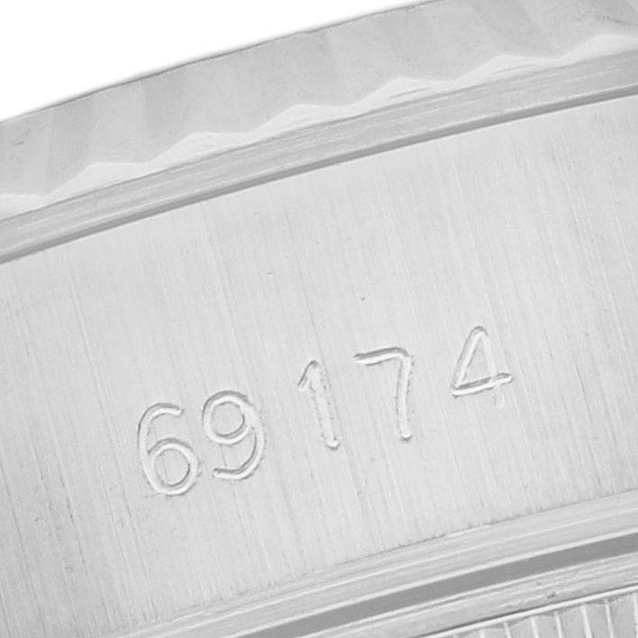 This is a close-up shot of the model number "69174" on the case of a Rolex Datejust 69174 Women's Stainless Steel Black Dial 69174 Women's Stainless Steel Black Dial watch.