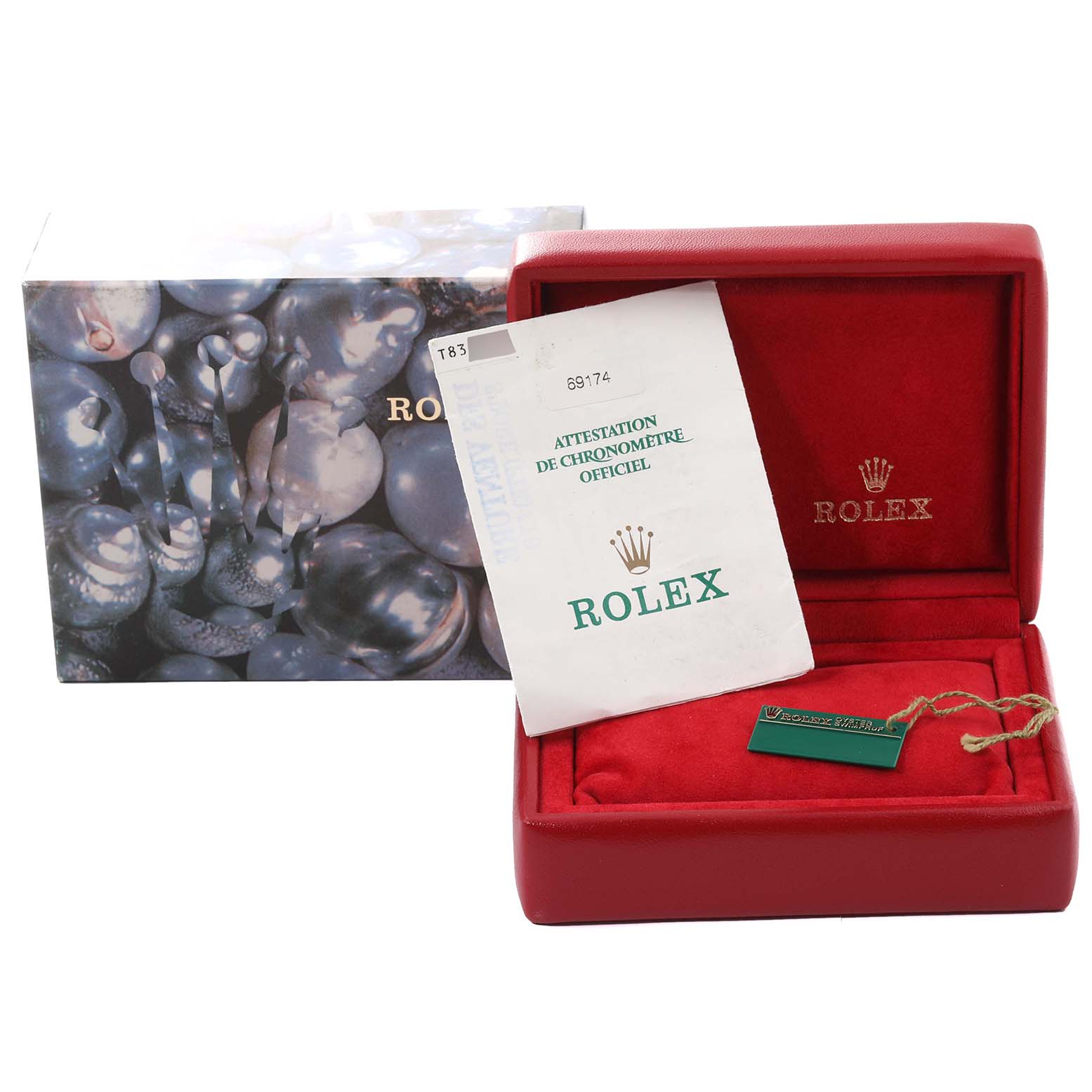 This image shows the packaging, manual, and accessories for a Rolex Datejust 69174 Women's Stainless Steel Silver Dial 69174 Women's Stainless Steel Silver Dial watch including a red box and certification.