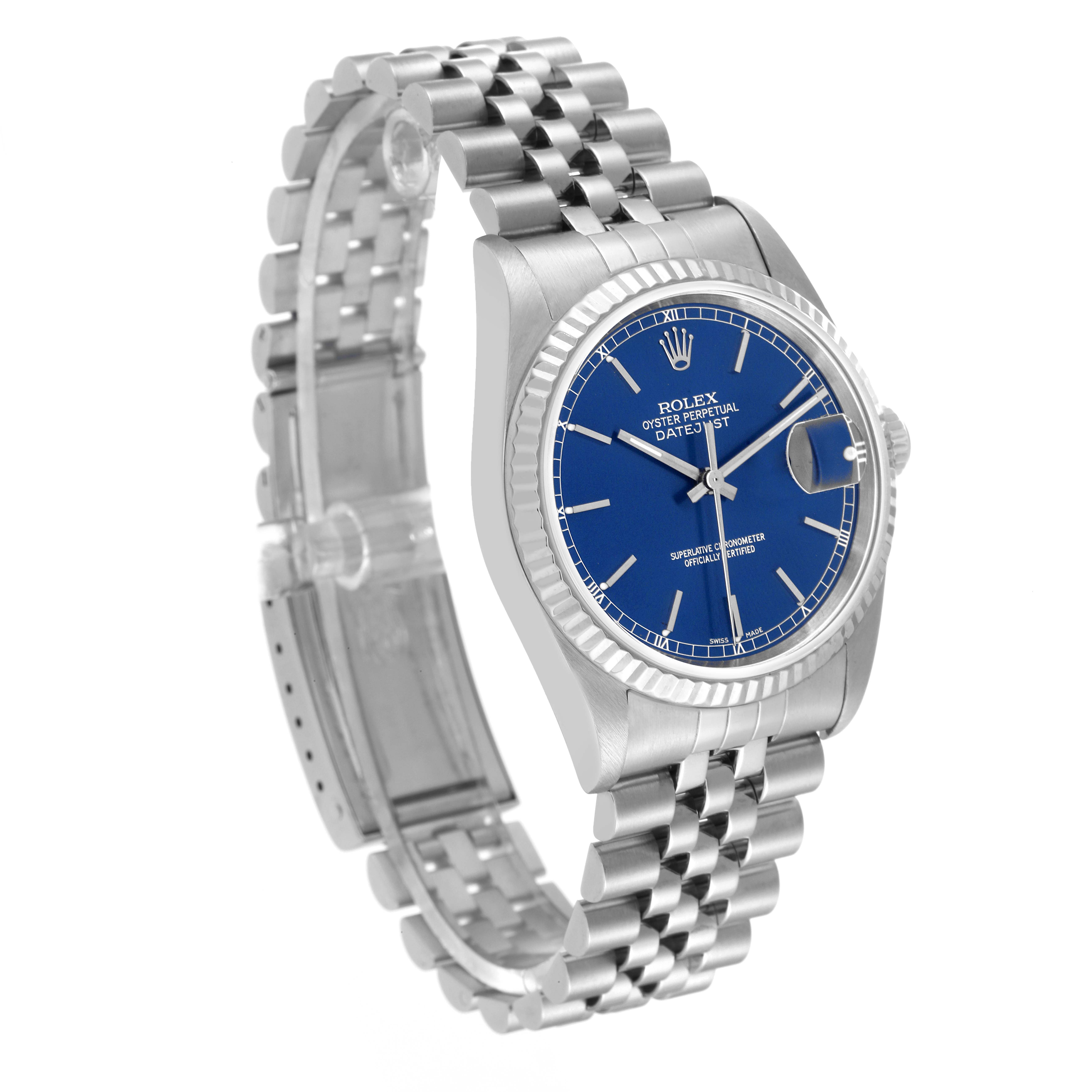 This image shows a Rolex Datejust 16234 Men's Stainless Steel Blue Dial 16234 Men's Stainless Steel Blue Dial watch at a three-quarter angle, displaying the blue dial, fluted bezel, and Jubilee bracelet.