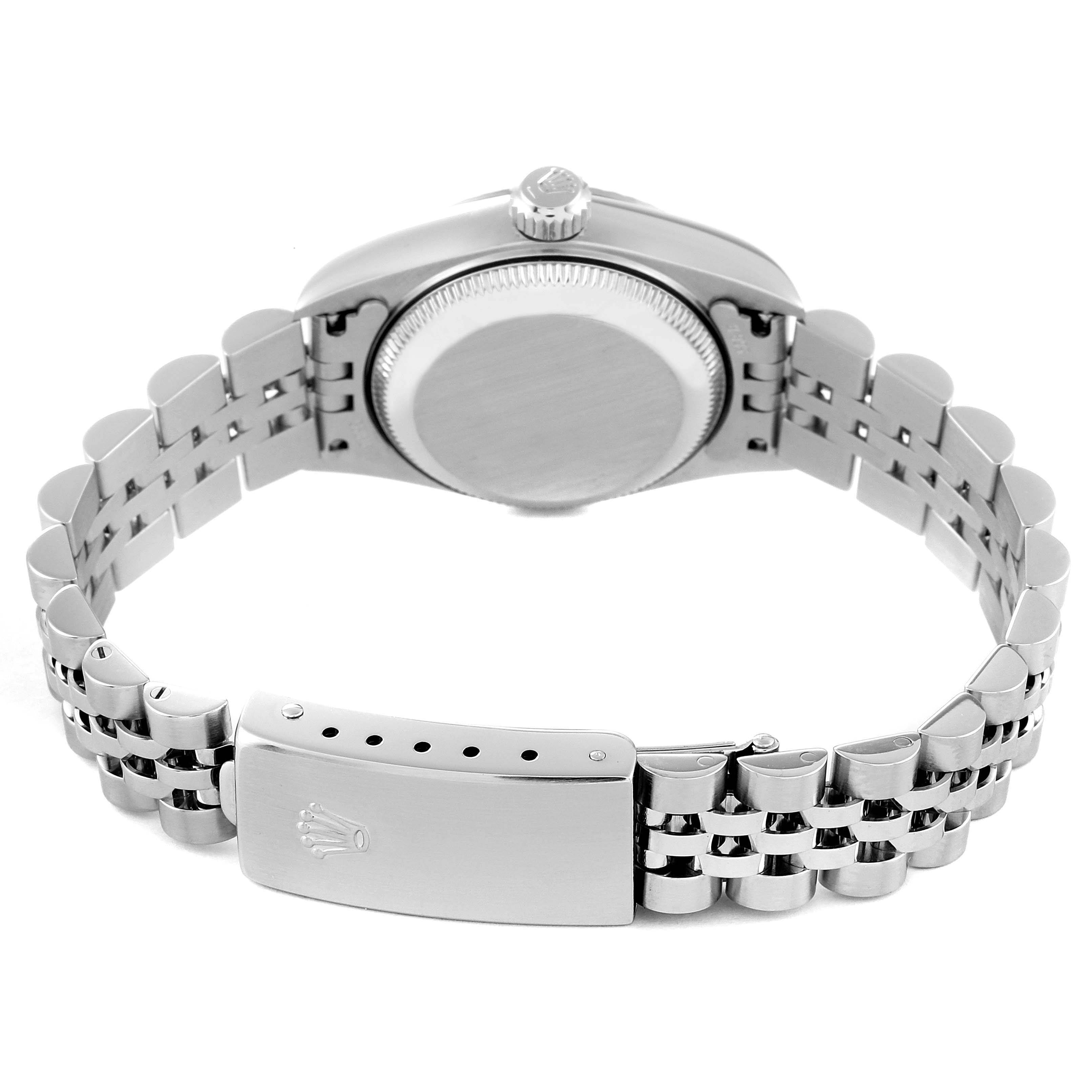 The image shows the back view of a Rolex Datejust 79174 Women's Stainless Steel Mother of Pearl Dial 79174 Women's Stainless Steel Mother of Pearl Dial watch, highlighting the case back, crown, and Jubilee bracelet with clasp.