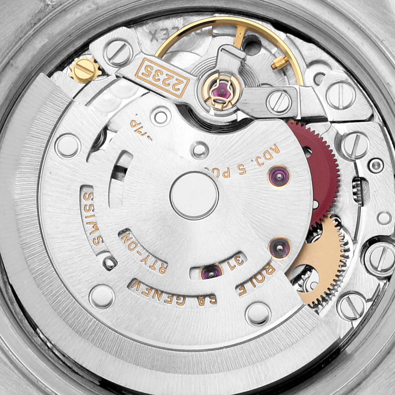 Close-up of the movement mechanism inside a Rolex Datejust 79174 Women's Stainless Steel Mother of Pearl Dial 79174 Women's Stainless Steel Mother of Pearl Dial watch, showcasing gears and internal components.