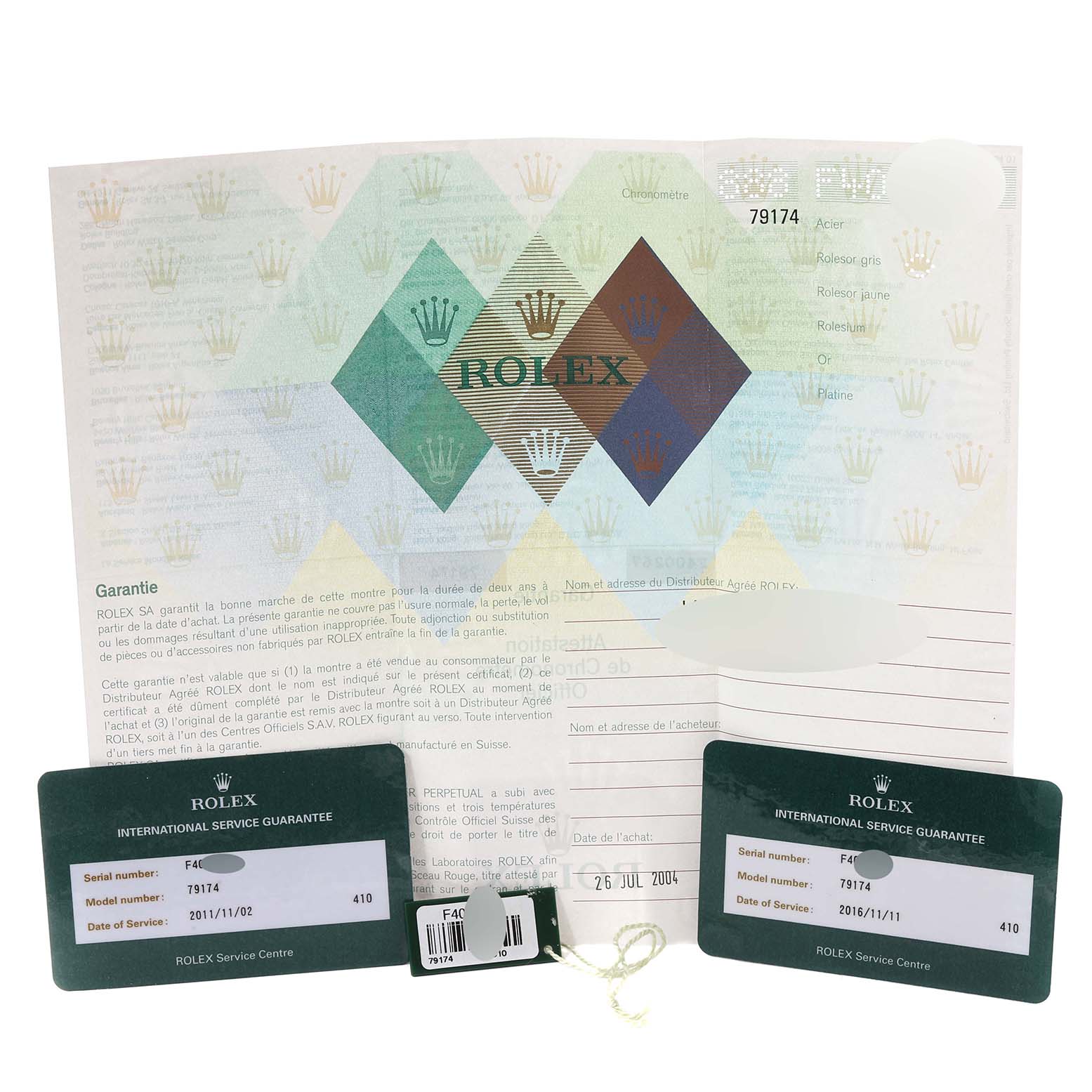 The image shows warranty documents and two green service guarantee cards for the Rolex Datejust 79174 Women's Stainless Steel Mother of Pearl Dial 79174 Women's Stainless Steel Mother of Pearl Dial model 79174.