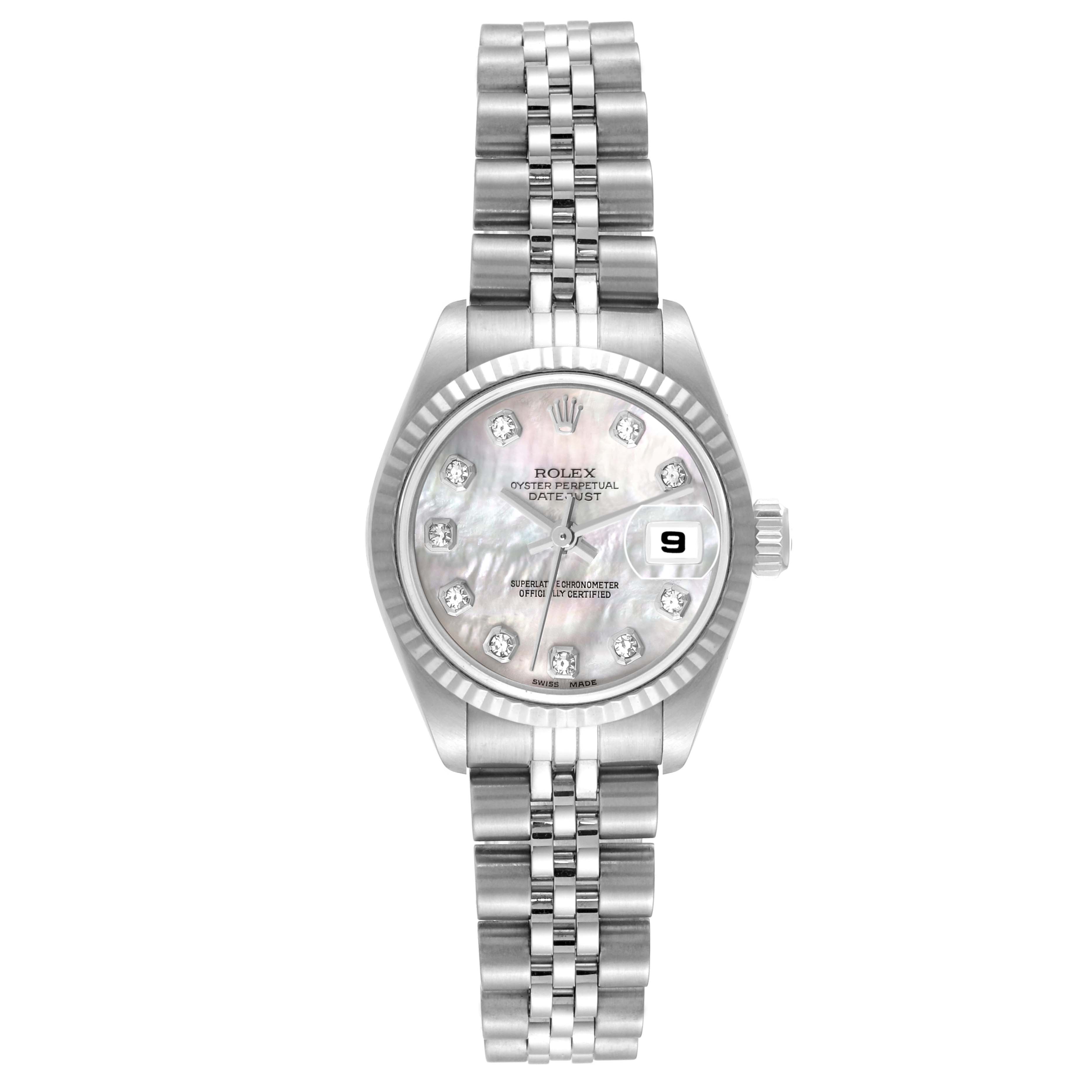 The image shows a top-down view of a Rolex Datejust 79174 Women's Stainless Steel Mother of Pearl Dial 79174 Women's Stainless Steel Mother of Pearl Dial watch featuring its dial, bracelet, and fluted bezel.