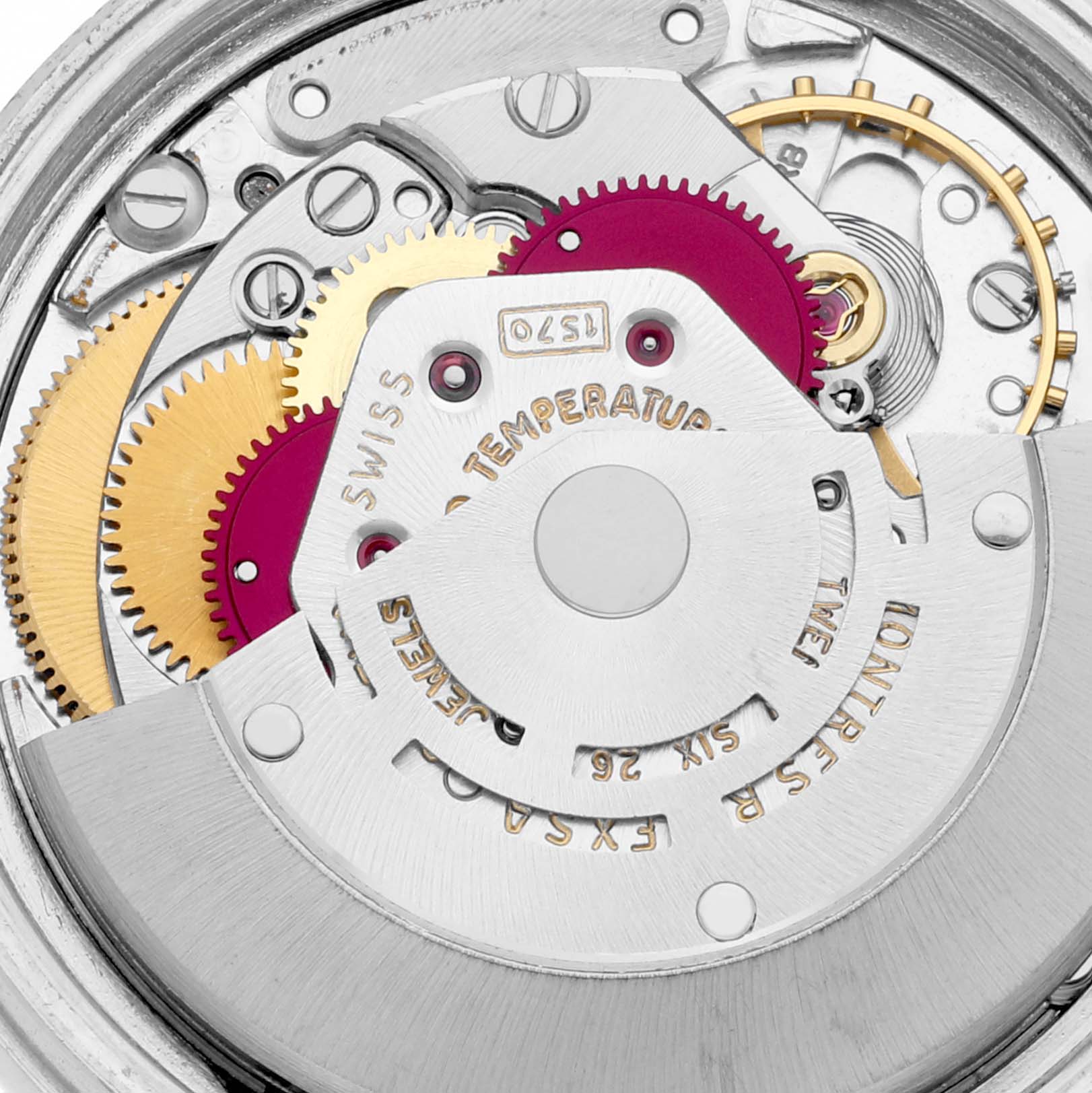 This image shows the inner mechanical movement of the Vintage Collection model by Rolex, focusing on the gears and intricate parts.