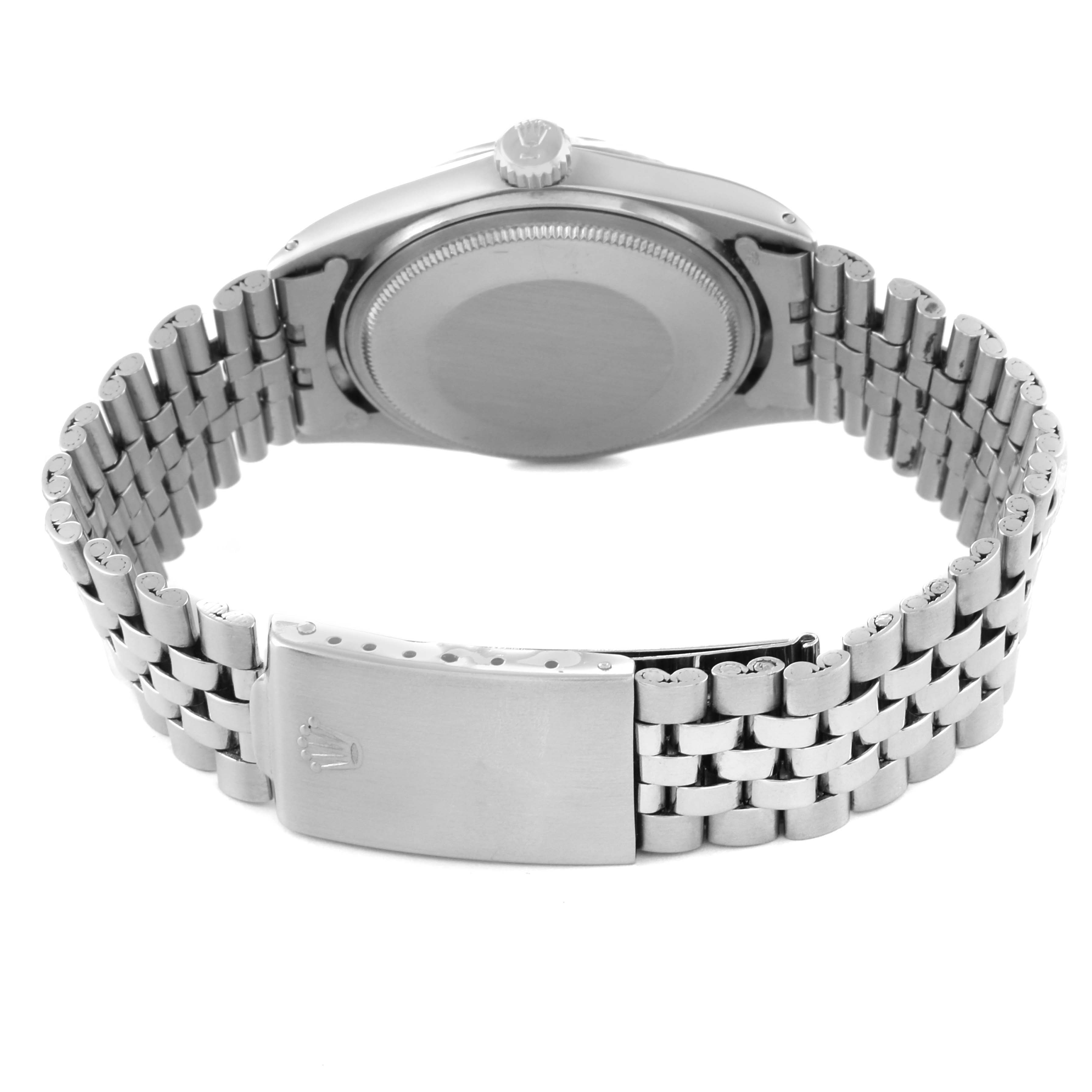 This image shows the back view of a Rolex Vintage Collection 1601 Men's Stainless Steel Silver Dial 1601 Men's Stainless Steel Silver Dial watch, highlighting the case back and the metallic bracelet clasp.