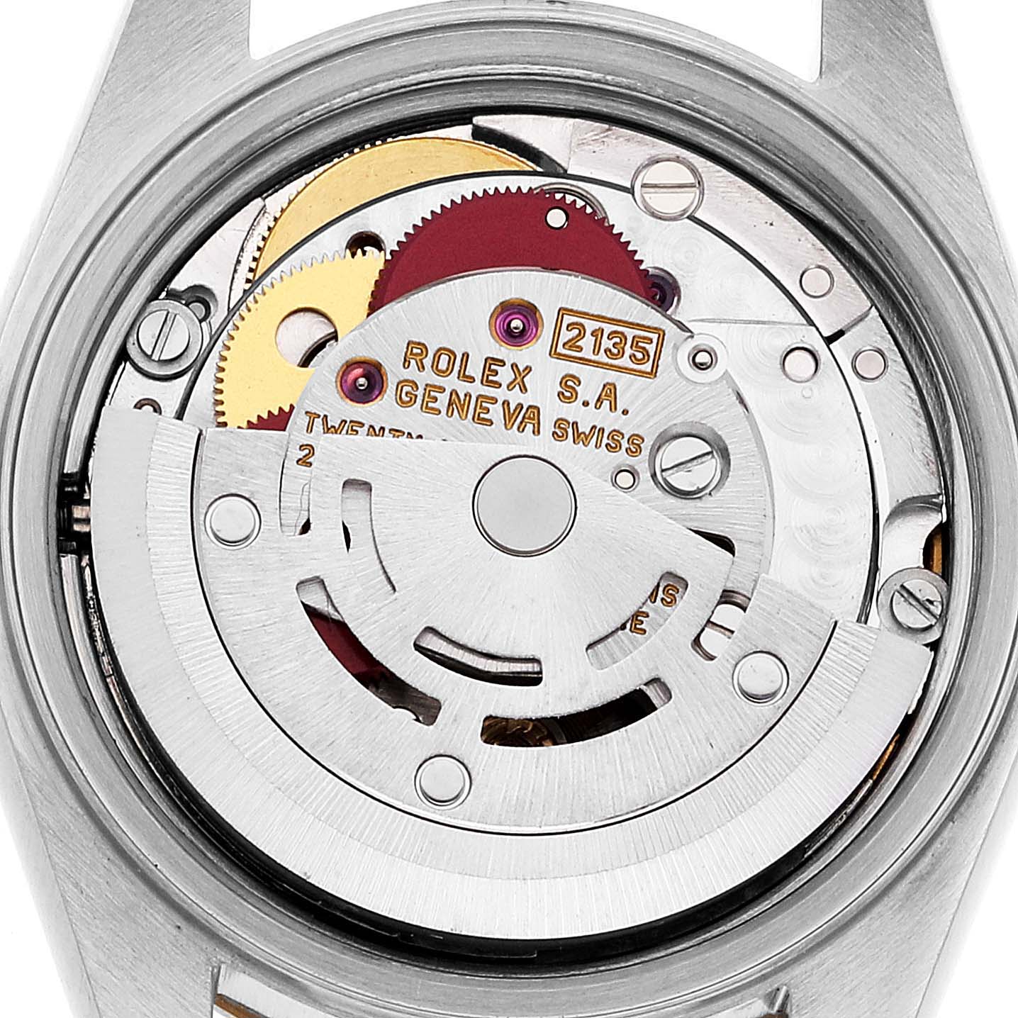 The image shows the intricate internal mechanism of a Rolex Datejust 69173 Women's Steel and Gold (two tone) Blue Dial 69173 Women's Steel and Gold (two tone) Blue Dial watch, featuring gears and the rotor.