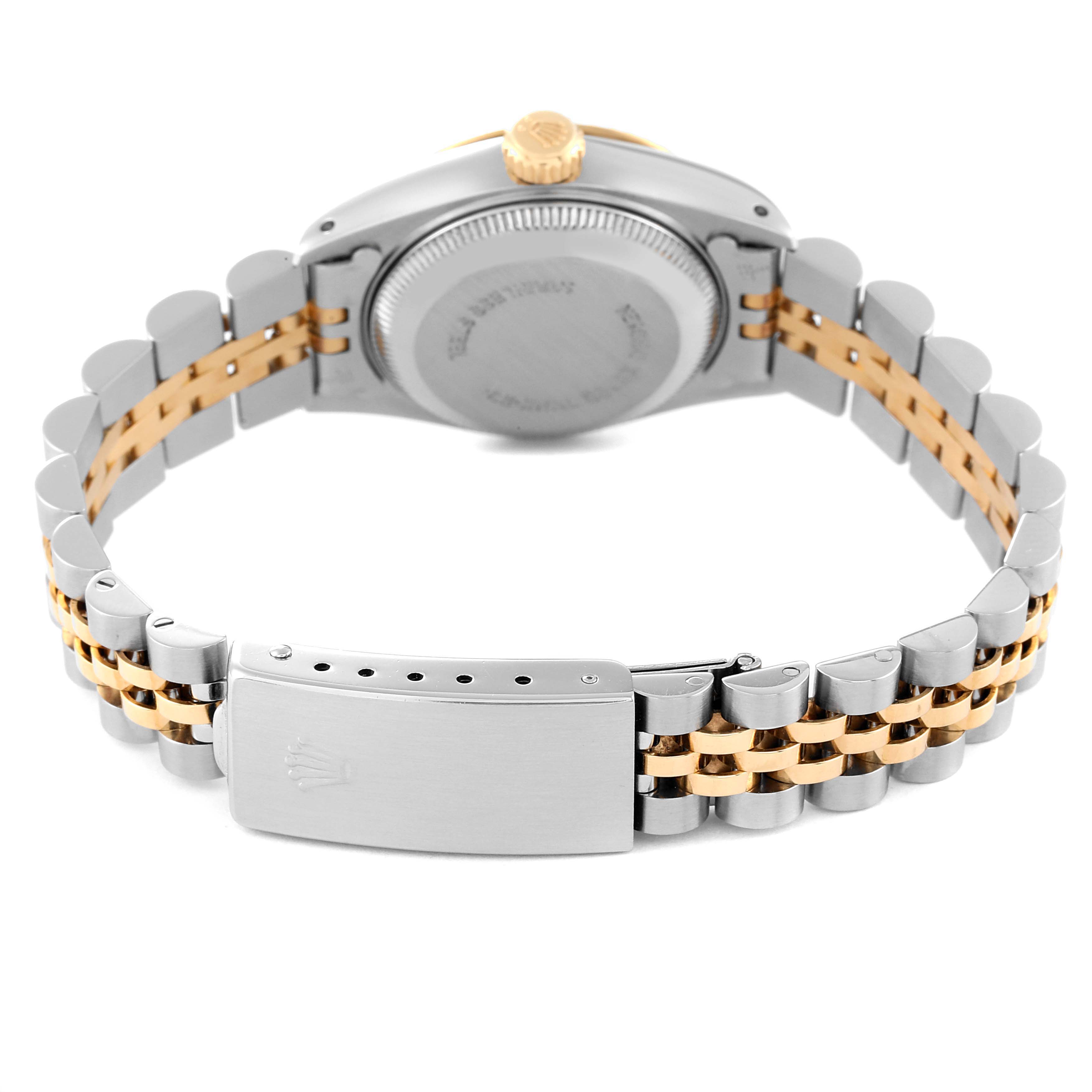 This image shows the back view of a Rolex Datejust 69173 Women's Steel and Gold (two tone) Champagne Dial 69173 Women's Steel and Gold (two tone) Champagne Dial watch, highlighting its case back and two-tone bracelet with a clasp.