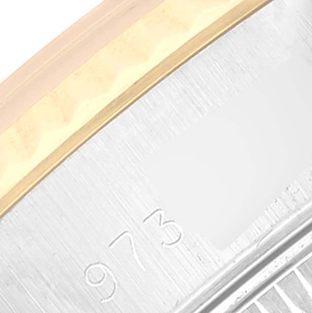 This image shows a partial close-up of the bezel and case of a Rolex Datejust 69173 Women's Steel and Gold (two tone) Champagne Dial 69173 Women's Steel and Gold (two tone) Champagne Dial watch, highlighting the model number engraving.
