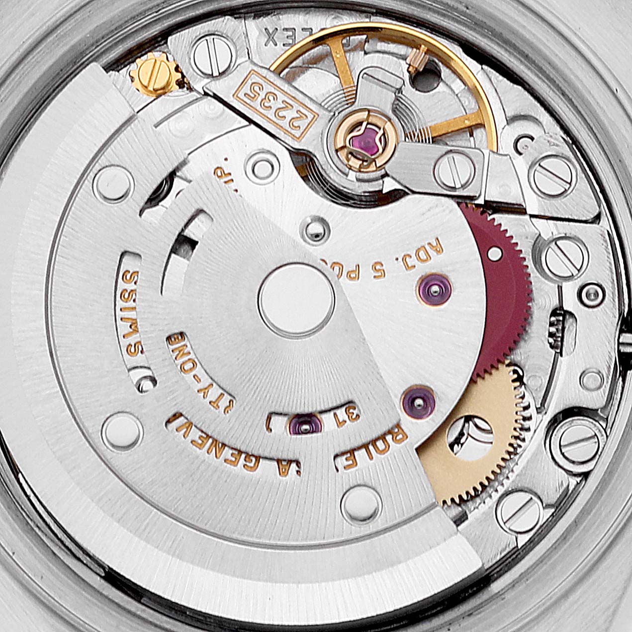 This close-up image shows the intricate movement of a Rolex Datejust 79173 Women's Steel and Gold (two tone) Mother of Pearl Dial 79173 Women's Steel and Gold (two tone) Mother of Pearl Dial watch from the back.