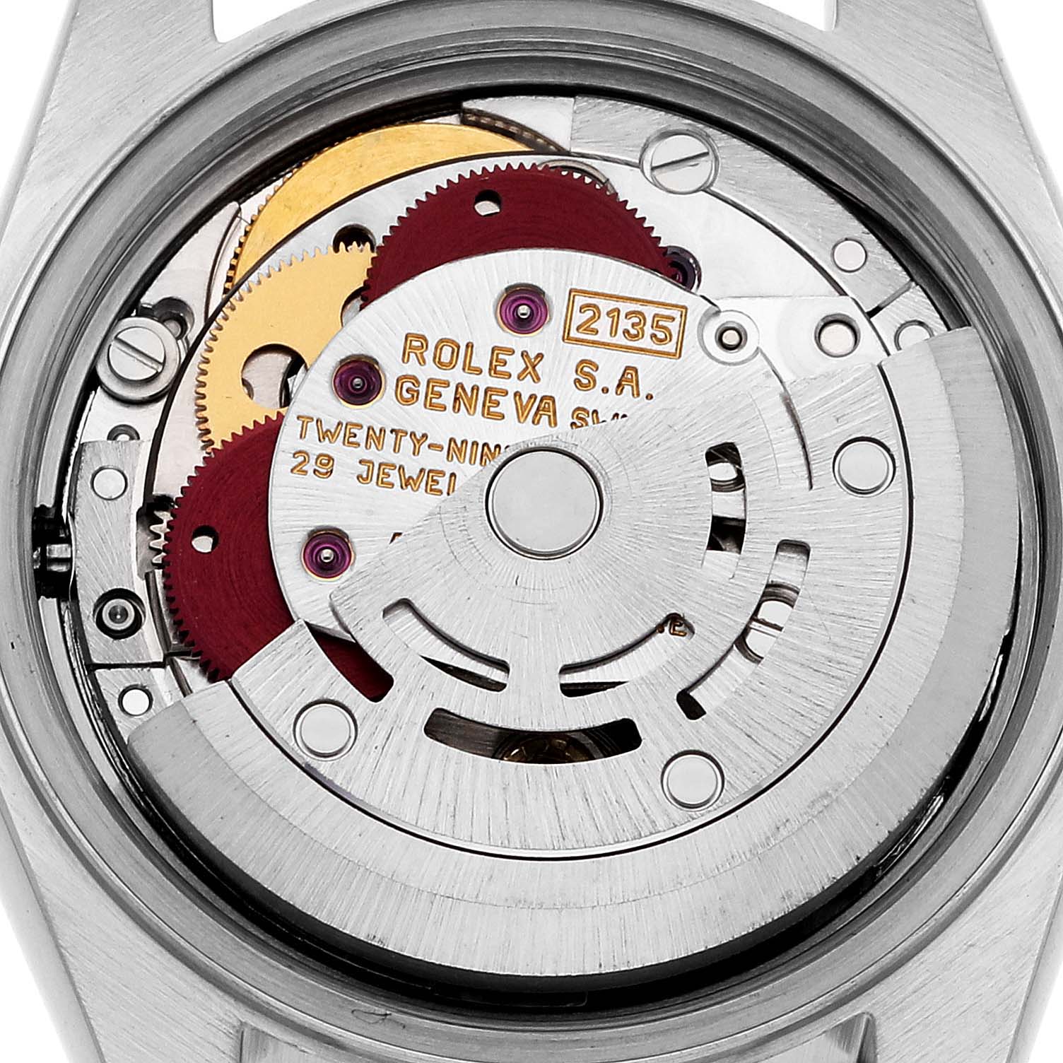 The image shows a close-up view of the movement mechanism inside the Rolex Datejust 69173G Women's Steel and Gold (two tone) White Dial 69173G Women's Steel and Gold (two tone) White Dial watch.