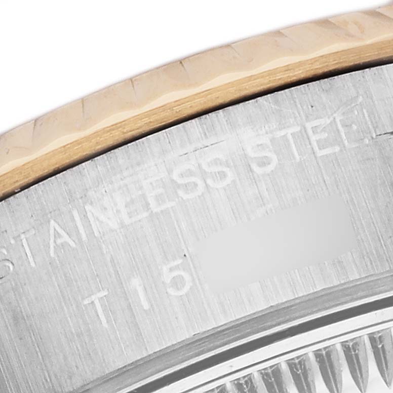 The image shows a close-up view of the bezel and part of the caseback of a Rolex Datejust 69173G Women's Steel and Gold (two tone) White Dial 69173G Women's Steel and Gold (two tone) White Dial watch.