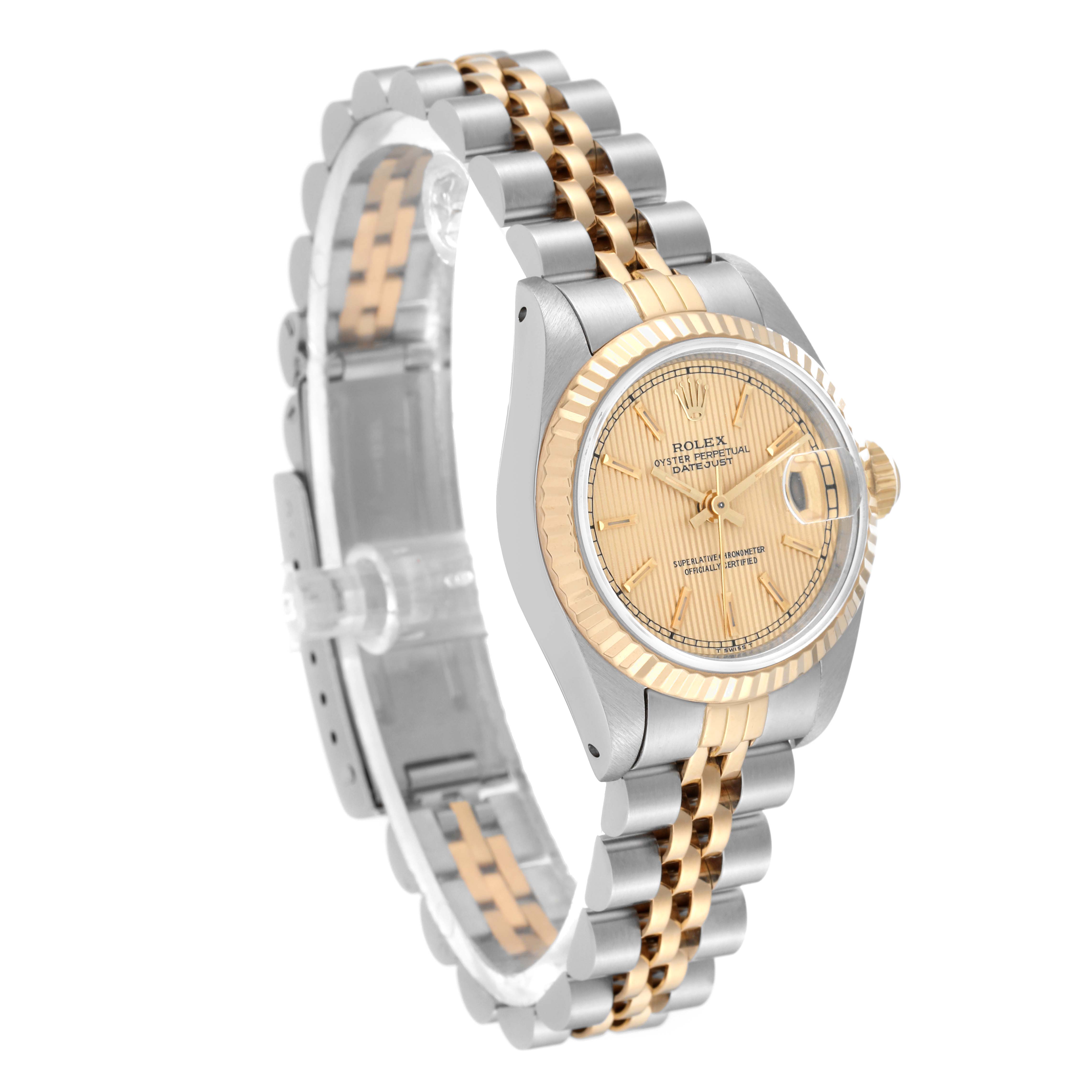 The image shows a side view of a Rolex Datejust 69173 Women's Steel and Gold (two tone) Champagne Dial 69173 Women's Steel and Gold (two tone) Champagne Dial watch, highlighting its two-tone band, face, and crown.