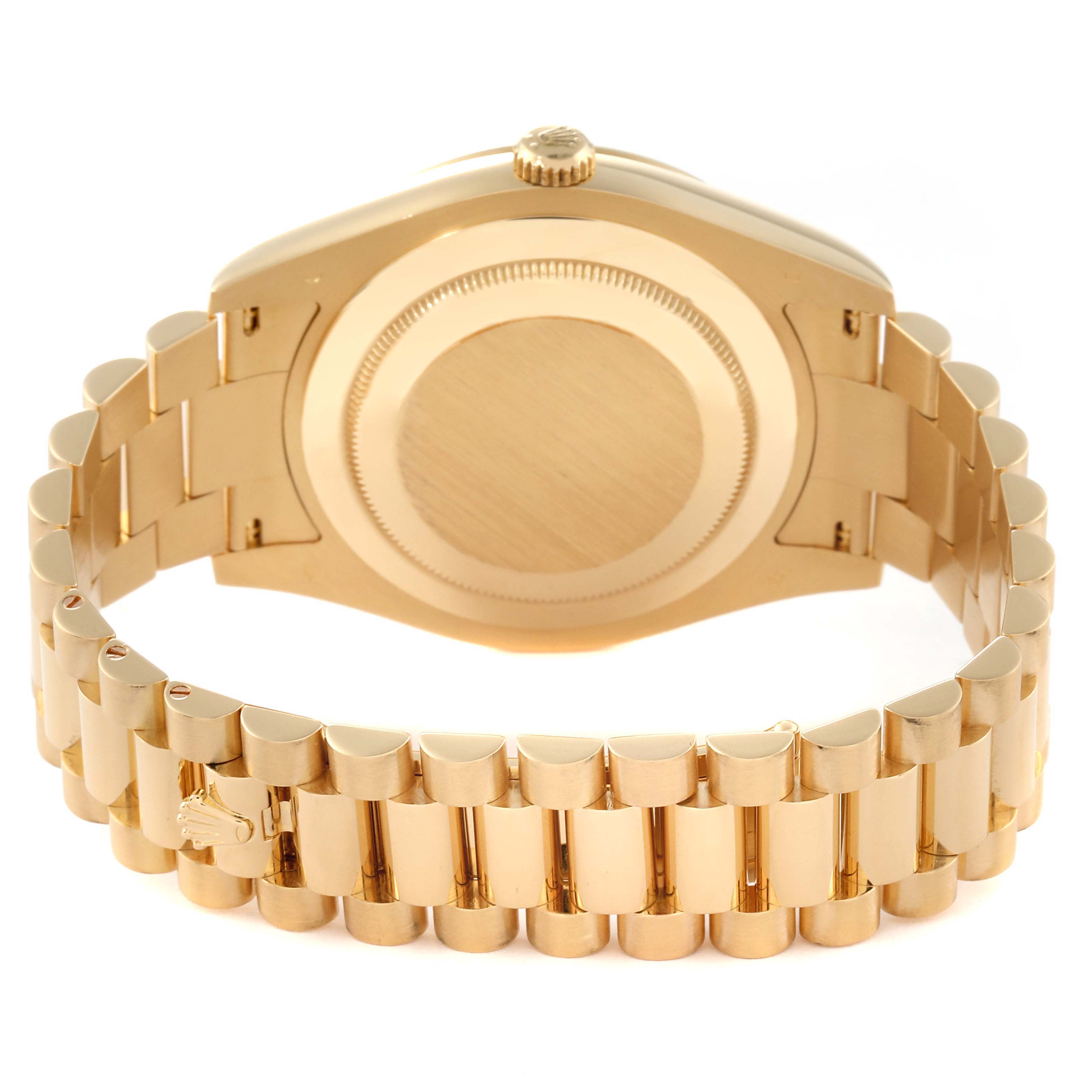 This image shows the back view of a Rolex President 218238 Men's Yellow Gold Black Dial 218238 Men's Yellow Gold Black Dial model watch, highlighting the bracelet and caseback.