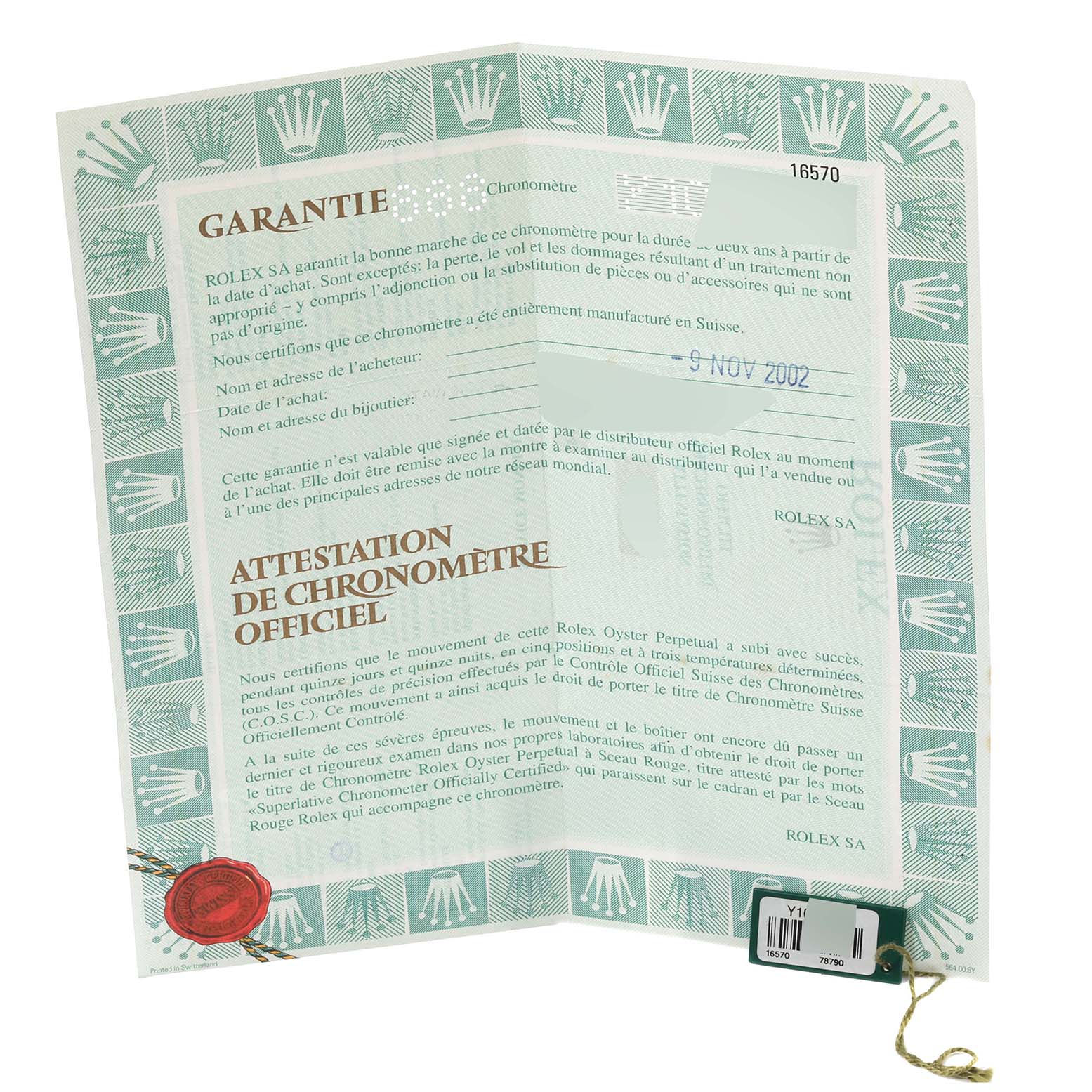 This image shows the warranty and certification paperwork for a Rolex Explorer 16570 Men's Stainless Steel White Dial 16570 Men's Stainless Steel White Dial model, including a chronometer certification and a tag with the model number.