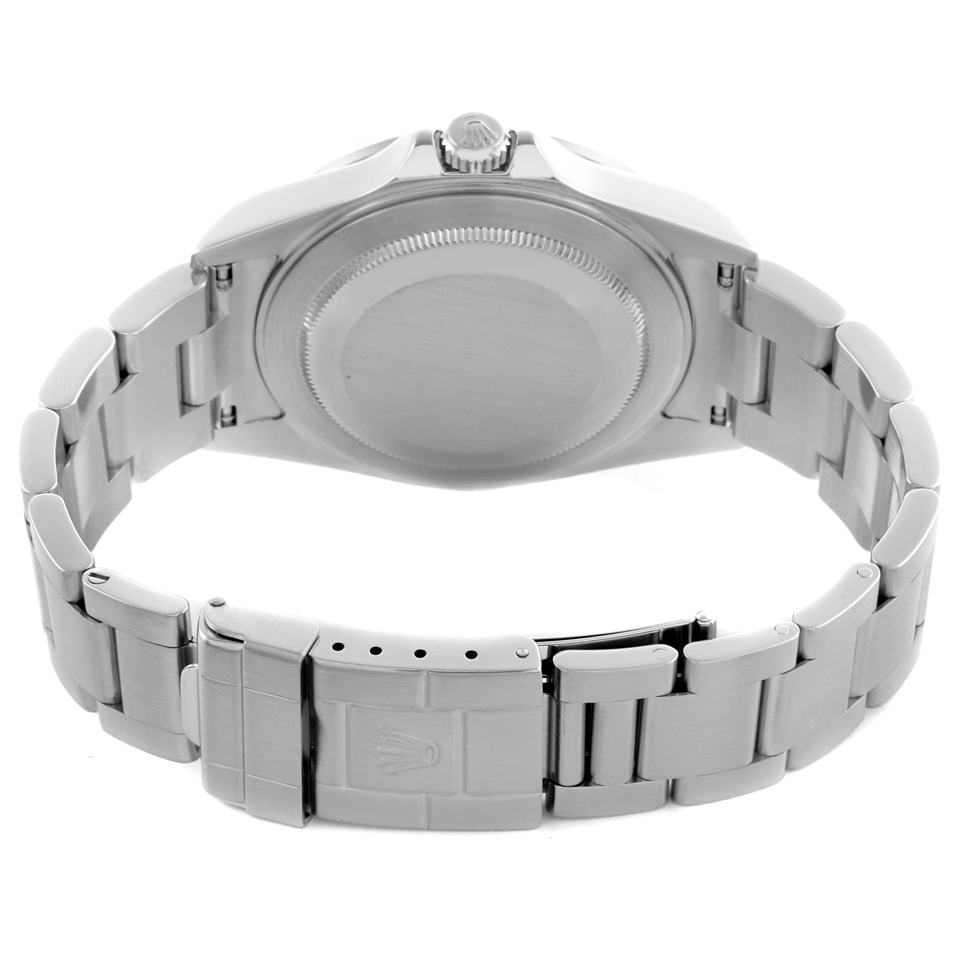 The image shows the back view of a Rolex Explorer 16570T Men's Stainless Steel Black Dial 16570T Men's Stainless Steel Black Dial watch, highlighting its clasp, bracelet, and case back.