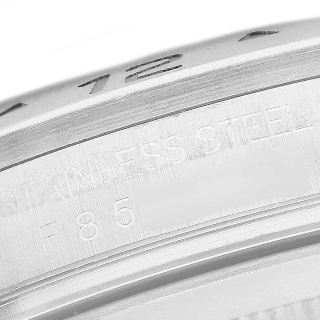 This close-up image shows the side engraving on the bezel and case of a Rolex Explorer 16570T Men's Stainless Steel Black Dial 16570T Men's Stainless Steel Black Dial watch, highlighting the material details.