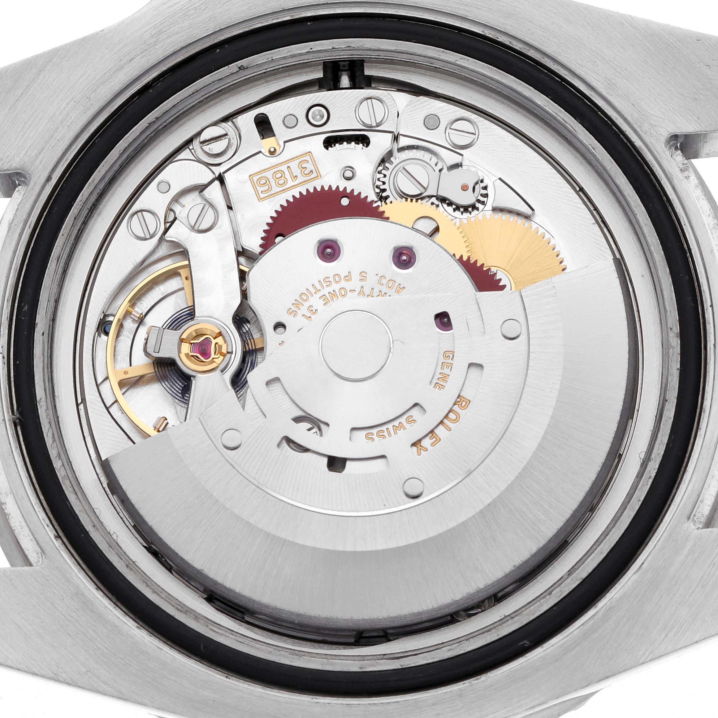 This image shows the movement and internal mechanics of a Rolex GMT-Master 116710BLNR Men's Stainless Steel Black Dial 116710BLNR Men's Stainless Steel Black Dial watch from a top-down angle.