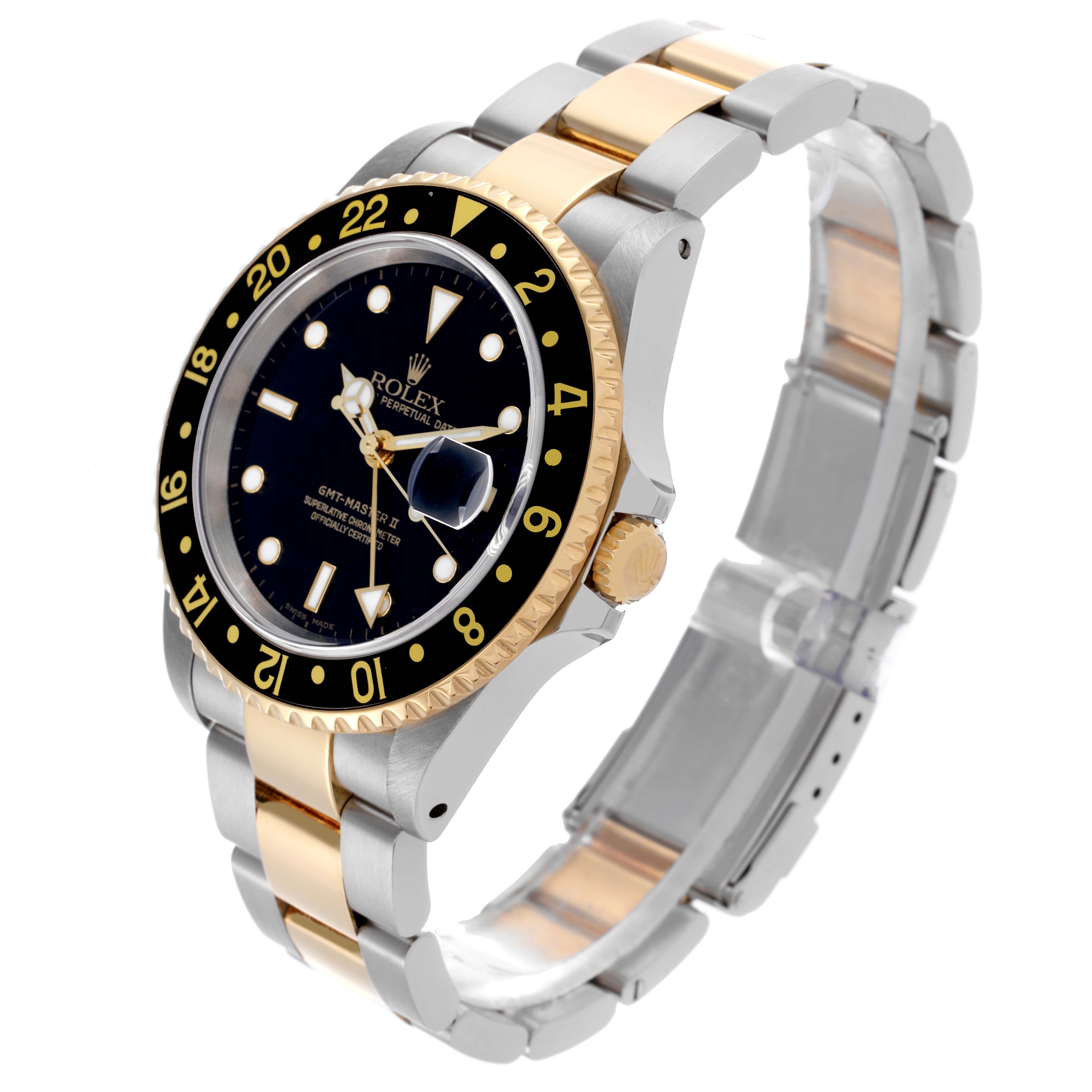 The Rolex GMT-Master 16713LN Men's Steel and Gold (two tone) Black Dial 16713LN Men's Steel and Gold (two tone) Black Dial watch is shown at a three-quarter angle highlighting the bezel, crown, bracelet, and dial.