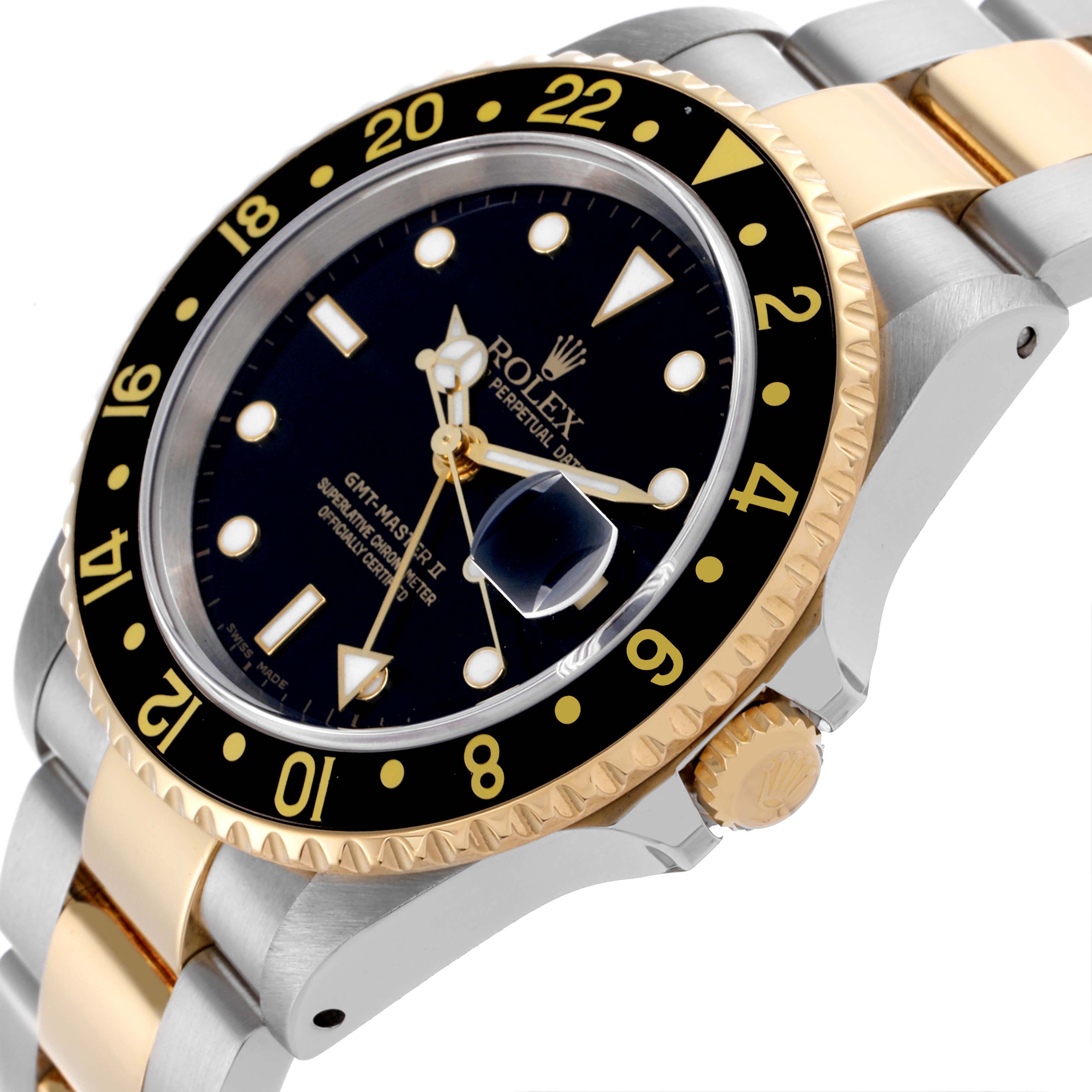This image shows a side angle of the Rolex GMT-Master 16713LN Men's Steel and Gold (two tone) Black Dial 16713LN Men's Steel and Gold (two tone) Black Dial, highlighting the bezel, dial, and part of the bracelet.