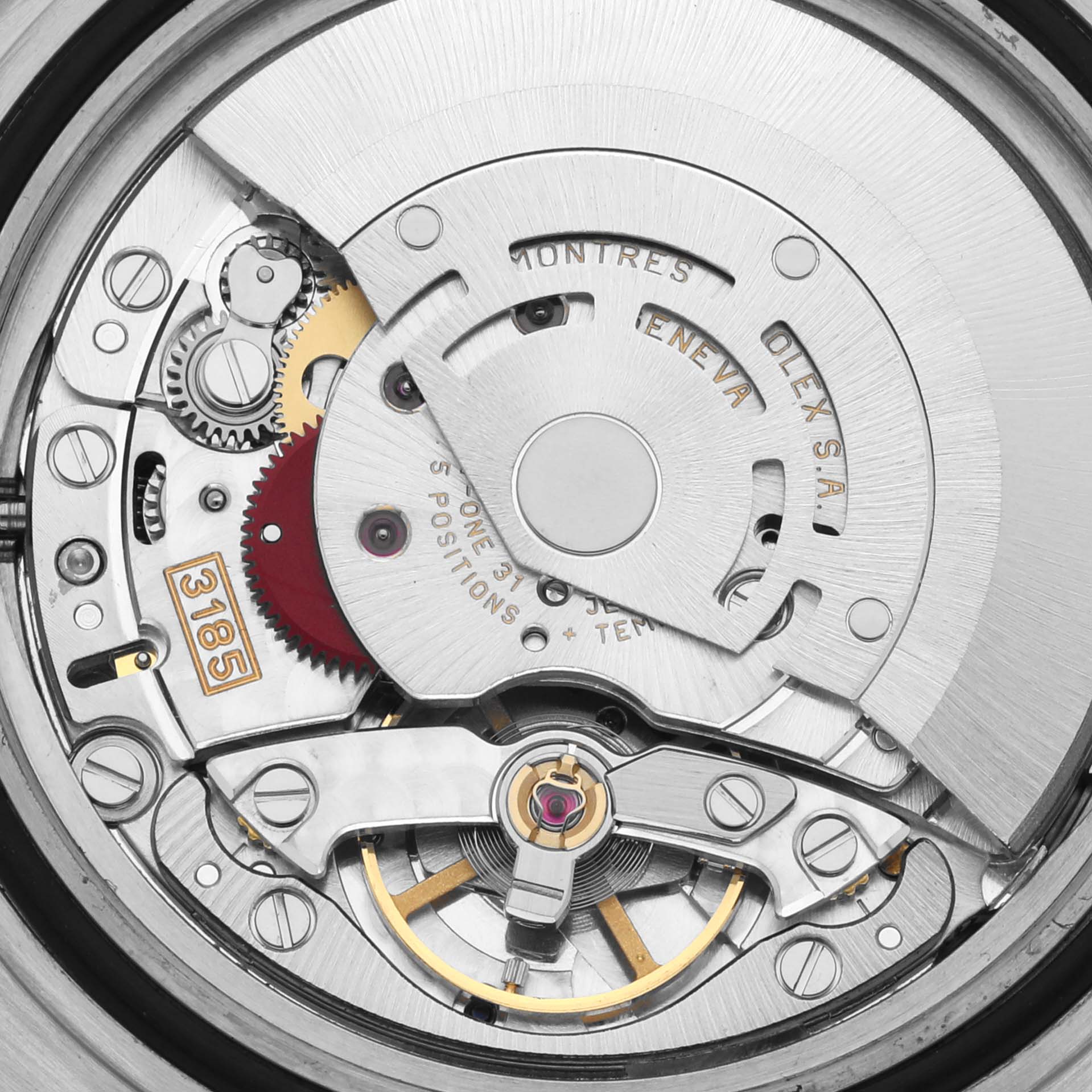 This image shows the internal movement of a Rolex GMT-Master 16713LN Men's Steel and Gold (two tone) Black Dial 16713LN Men's Steel and Gold (two tone) Black Dial, highlighting gears and the rotor from a top-down angle.