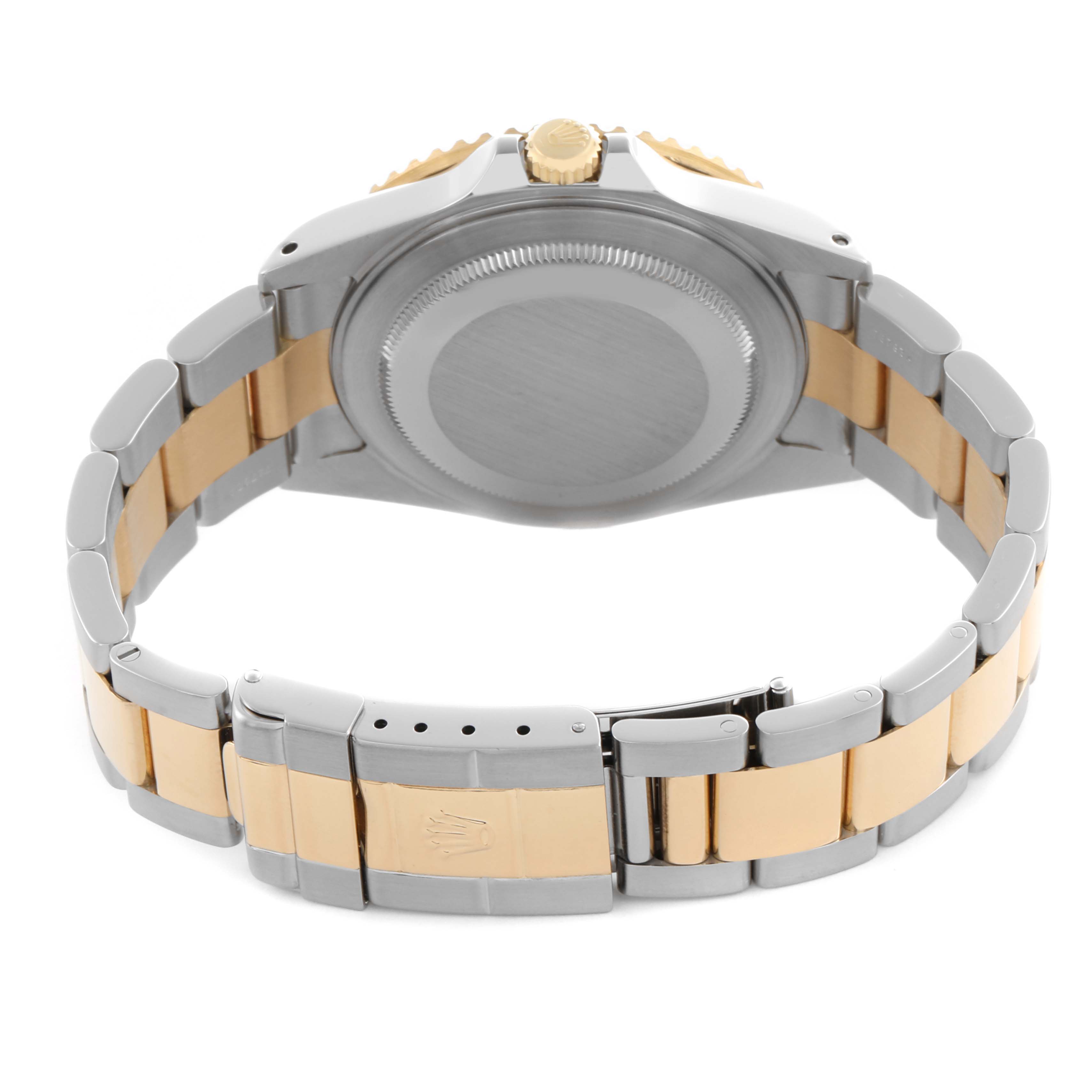 The image shows the back and bracelet of a Rolex GMT-Master 16713LN Men's Steel and Gold (two tone) Black Dial 16713LN Men's Steel and Gold (two tone) Black Dial, highlighting its two-tone metal and clasp design.