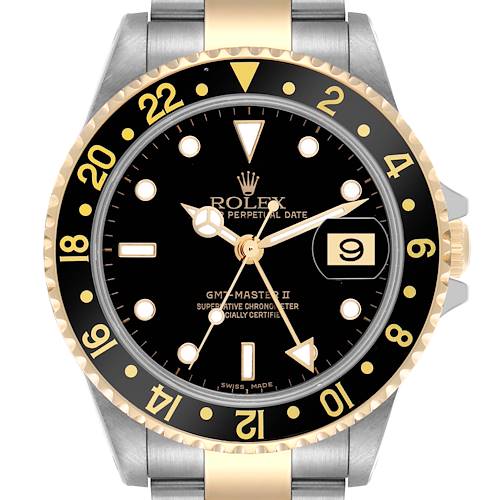 The Rolex GMT-Master watch is shown from a top-down angle, displaying the dial, bezel, hands, and date.