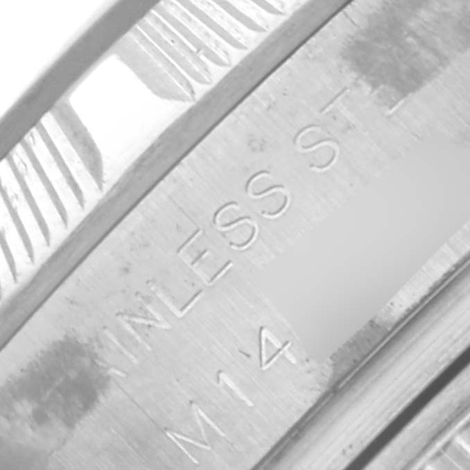 The image shows a close-up of the side of a Rolex Oyster Perpetual 176210 Women's Stainless Steel Pink Dial 176210 Women's Stainless Steel Pink Dial watch, highlighting the stainless steel material.