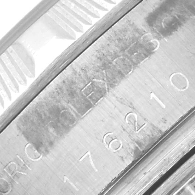 The image shows a close-up of the side engraving on the case of a Rolex Oyster Perpetual 176210 Women's Stainless Steel Pink Dial 176210 Women's Stainless Steel Pink Dial watch.