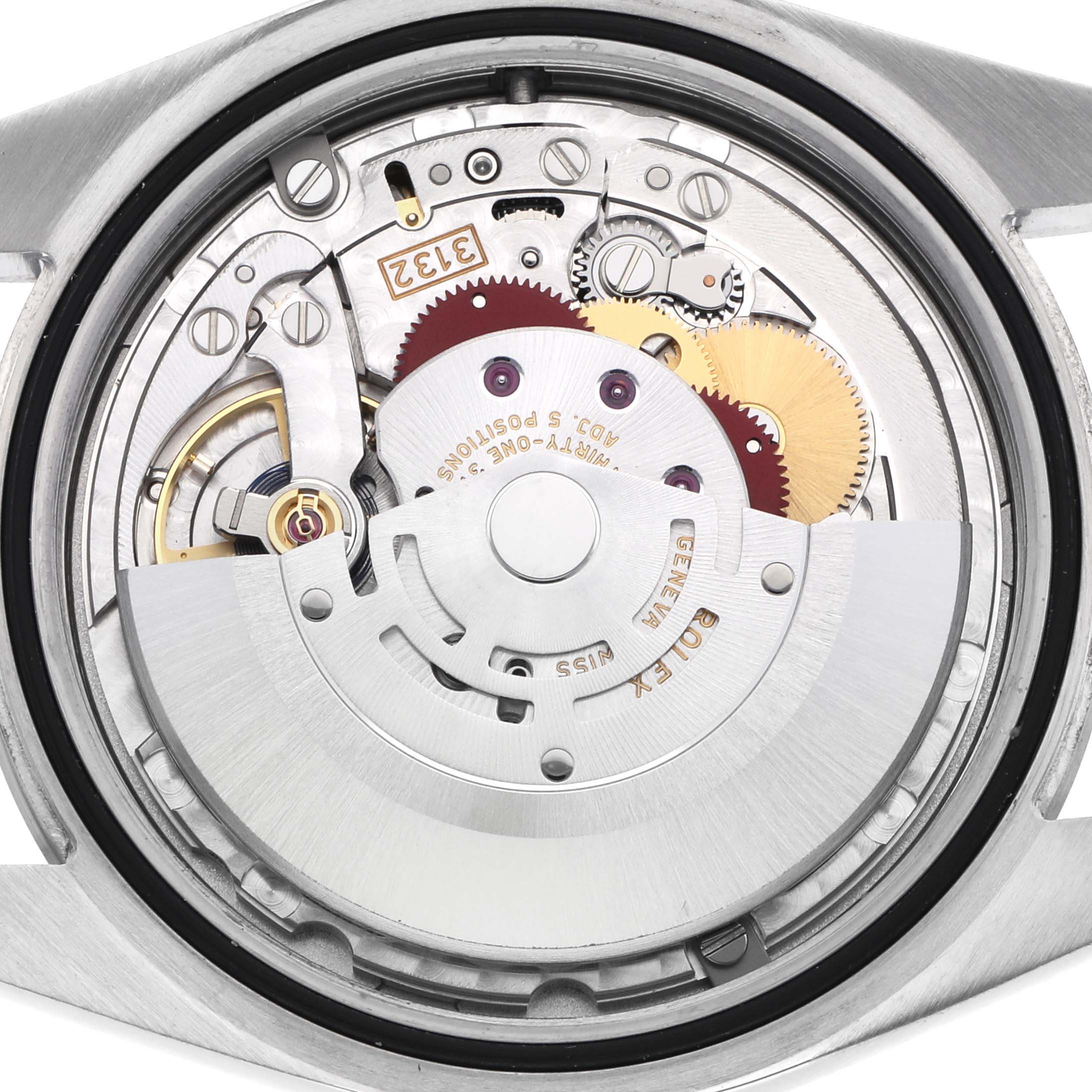 The image shows the movement and internal mechanism of a Rolex Oyster Perpetual 114300 Men's Stainless Steel Purple Dial 114300 Men's Stainless Steel Purple Dial watch, viewed from the back.