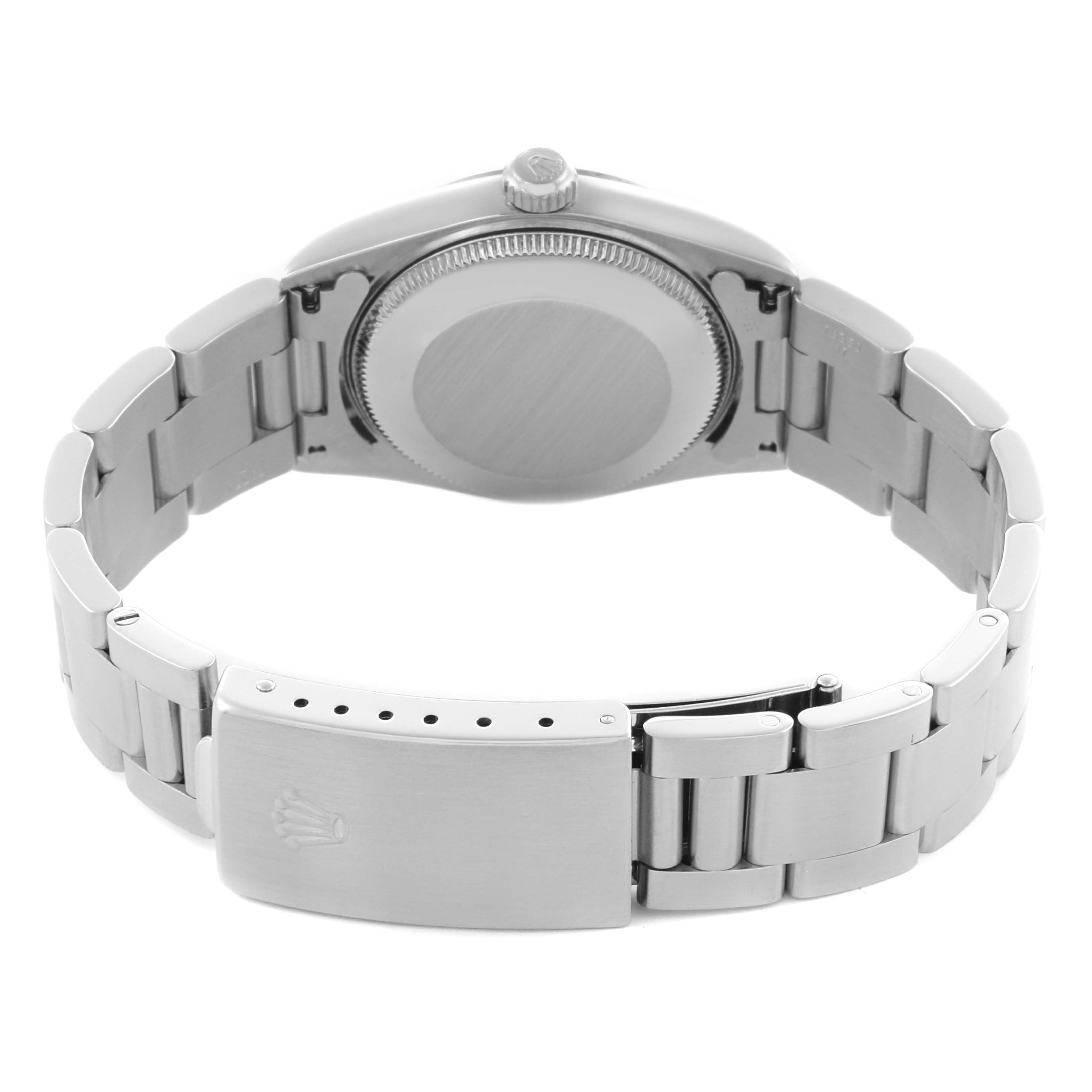 The image shows the back view of a Rolex Mid-Size 77080 Women's Stainless Steel Silver Dial 77080 Women's Stainless Steel Silver Dial model, highlighting the case back and bracelet clasp.