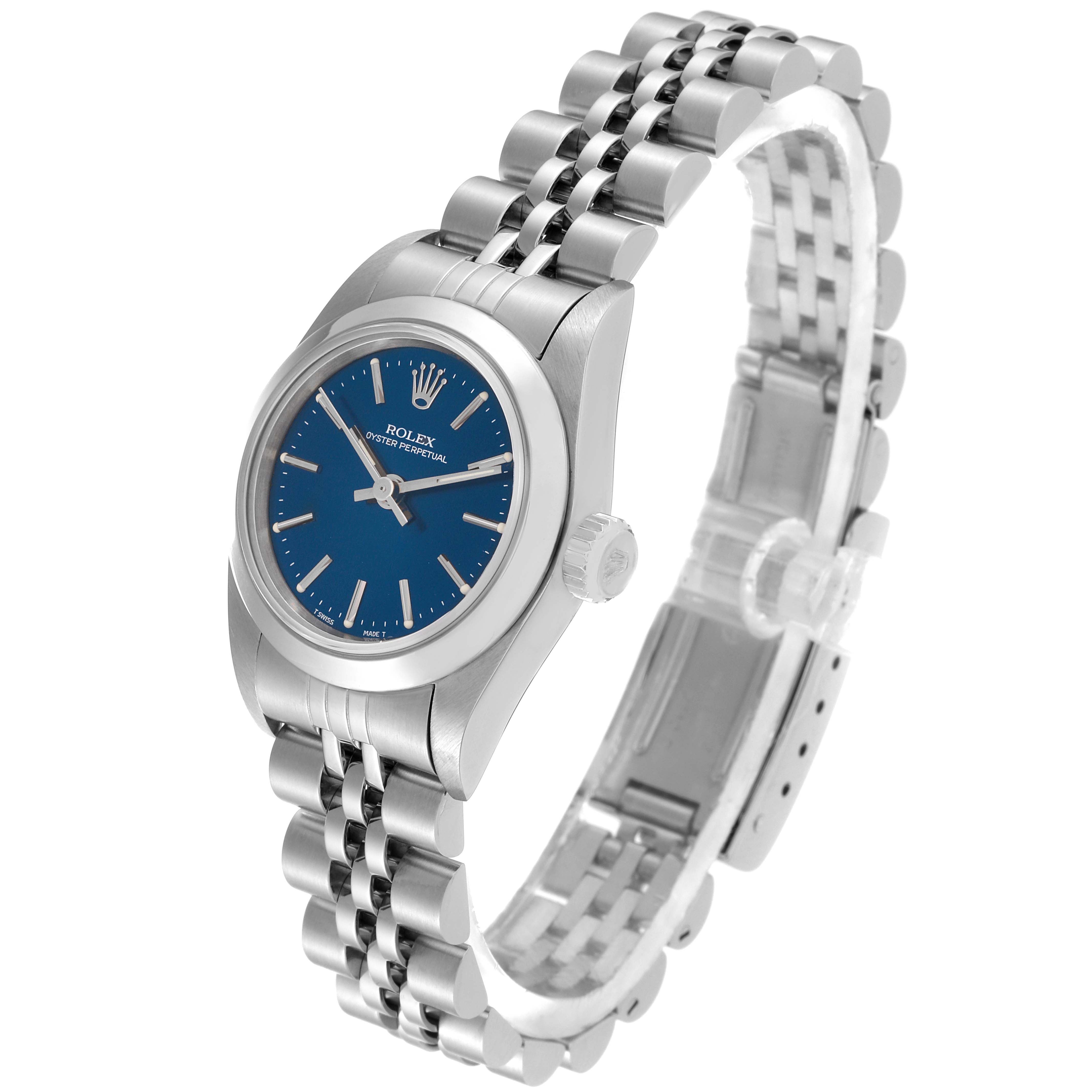 The image shows a Rolex Oyster Perpetual 67180 Women's Stainless Steel Blue Dial 67180 Women's Stainless Steel Blue Dial watch from a three-quarter angle featuring its blue dial, case, and bracelet.