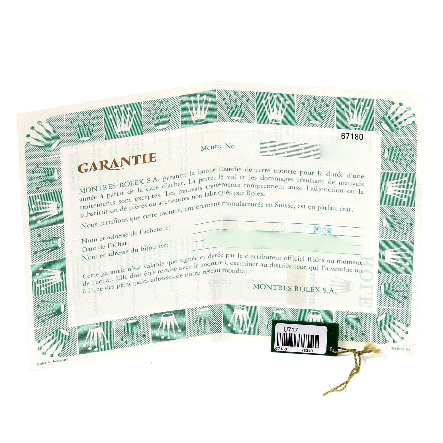 This image displays the warranty card and tag of a Rolex Oyster Perpetual 67180 Women's Stainless Steel Blue Dial 67180 Women's Stainless Steel Blue Dial watch.