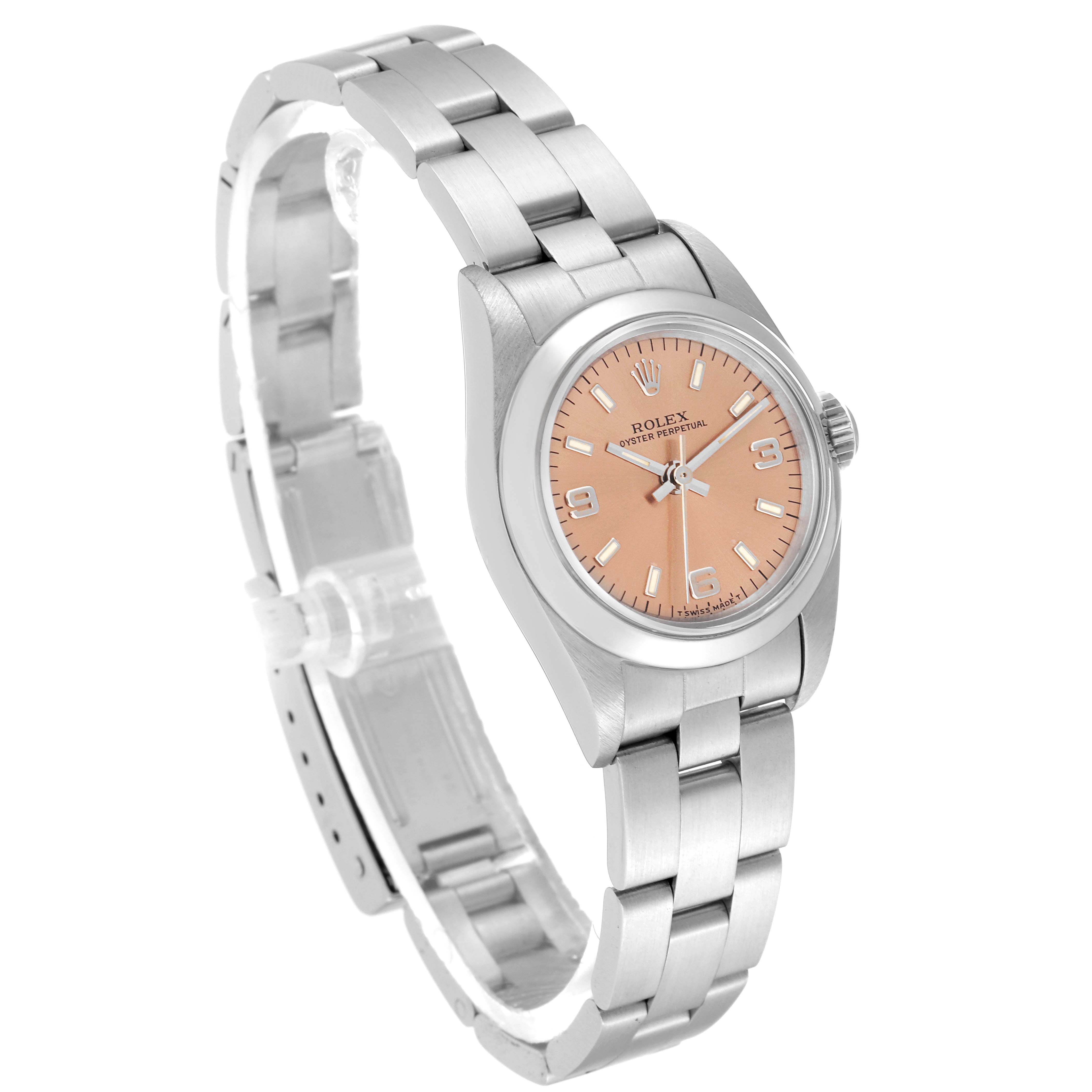 The Rolex Oyster Perpetual 67180 Women's Stainless Steel Pink Dial 67180 Women's Stainless Steel Pink Dial watch is shown from a three-quarter angle, displaying the peach dial, bezel, and full stainless steel bracelet.