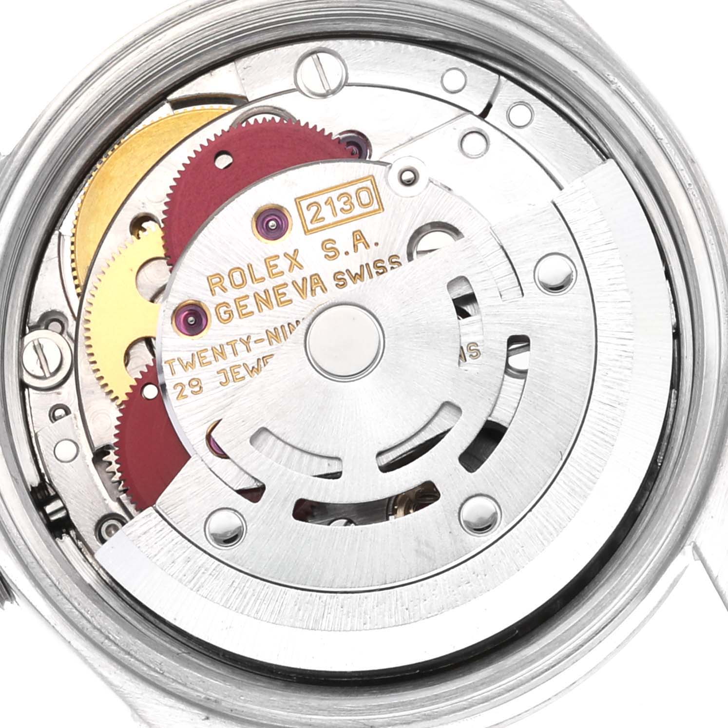 This image shows a close-up view of the internal movement mechanism of a Rolex Oyster Perpetual 67180 Women's Stainless Steel Pink Dial 67180 Women's Stainless Steel Pink Dial watch.