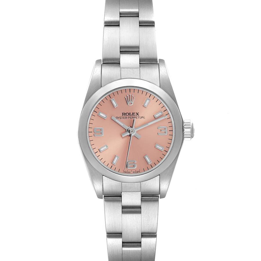 The Rolex Oyster Perpetual watch is shown from a top-down angle, highlighting the face, bezel, and bracelet.