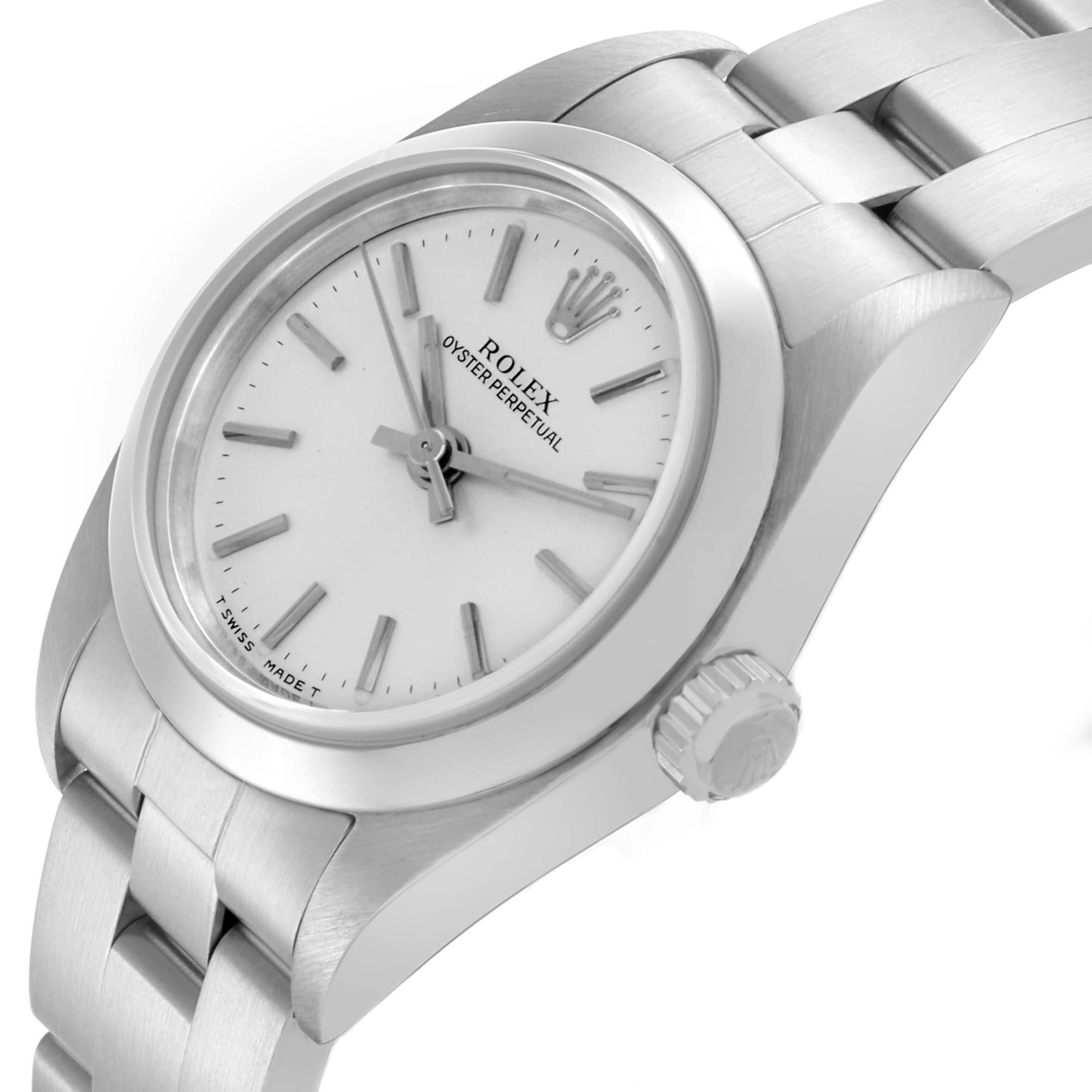 The Rolex Oyster Perpetual 76080 Women's Stainless Steel Silver Dial 76080 Women's Stainless Steel Silver Dial watch is shown at an angled side view, highlighting the case, dial, bezel, and part of the bracelet.