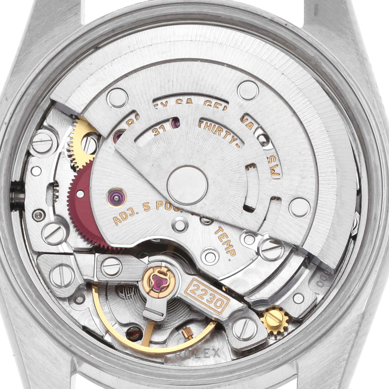 The image shows the movement of a Rolex Oyster Perpetual 76080 Women's Stainless Steel Silver Dial 76080 Women's Stainless Steel Silver Dial watch from a top-down angle, highlighting the intricate mechanics.