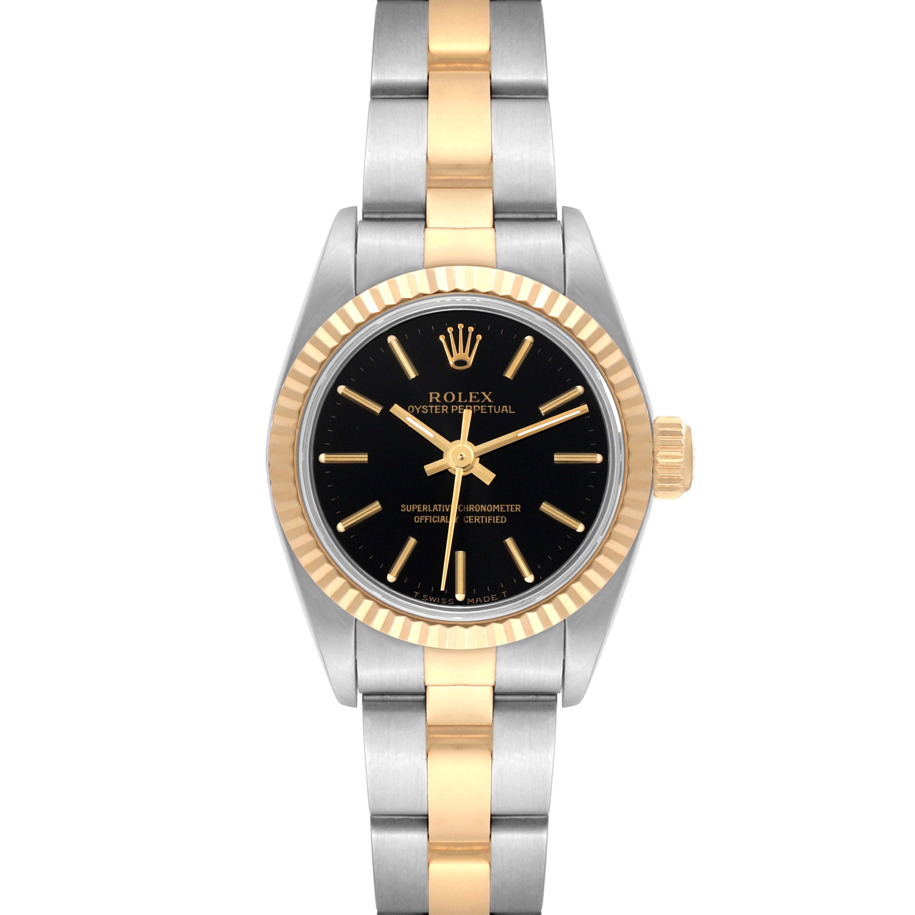 The Rolex Oyster Perpetual 67193 Women's Steel and Gold (two tone) Black Dial 67193 Women's Steel and Gold (two tone) Black Dial watch is shown from a front view, displaying its black dial, gold bezel, and two-tone bracelet.