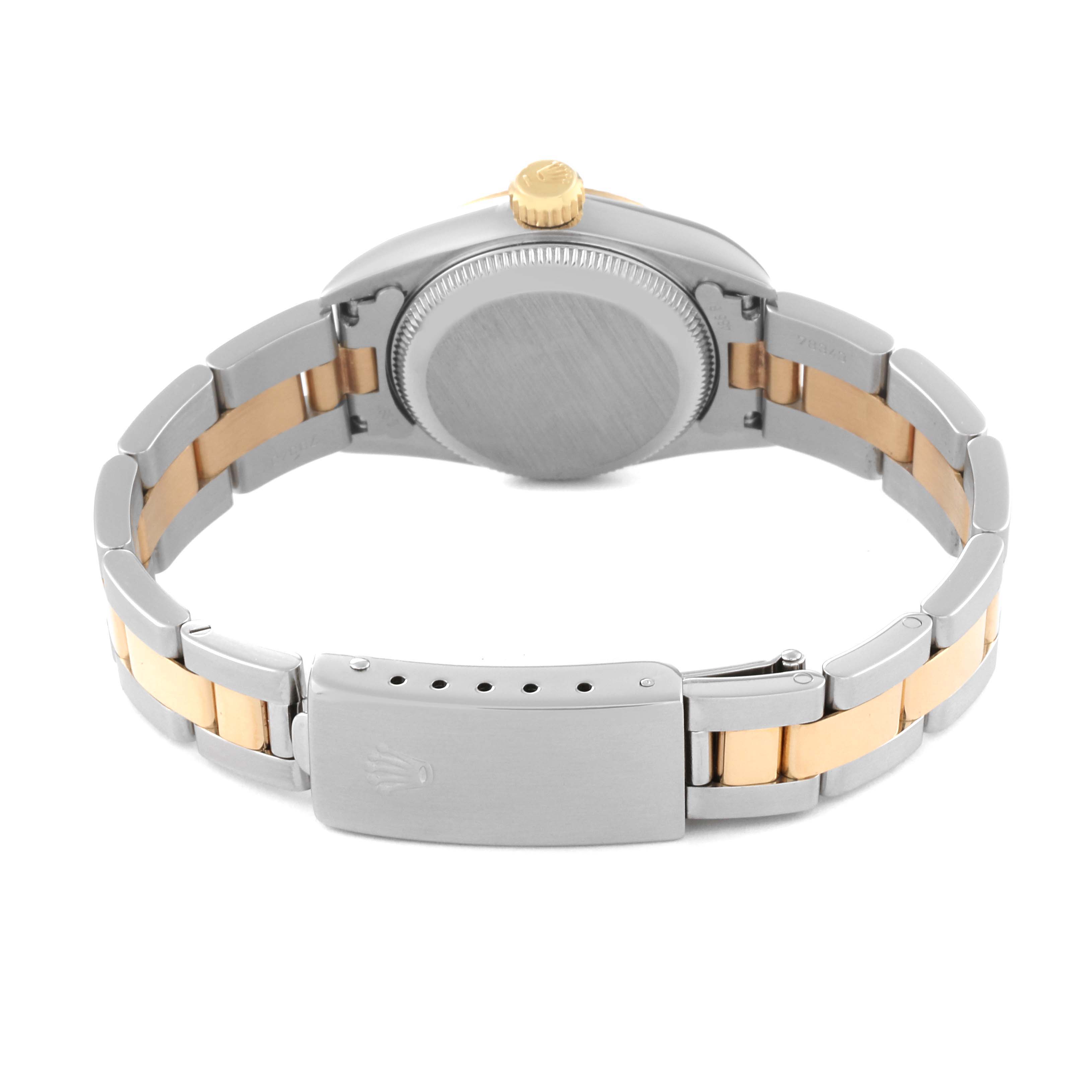This image shows the back of a Rolex Oyster Perpetual 67193 Women's Steel and Gold (two tone) Black Dial 67193 Women's Steel and Gold (two tone) Black Dial watch, highlighting its clasp and bracelet.