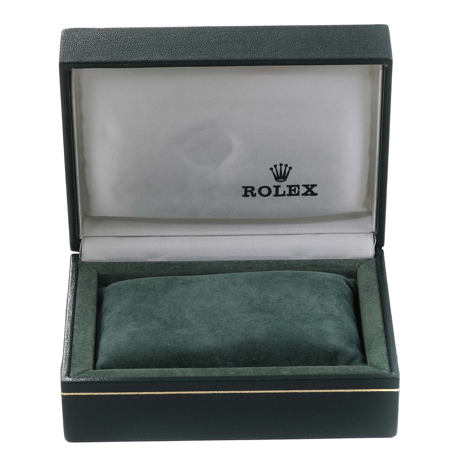 This image shows an open green box for the Rolex Oyster Perpetual 67193 Women's Steel and Gold (two tone) Black Dial 67193 Women's Steel and Gold (two tone) Black Dial watch, featuring a cushion and the Rolex logo inside the lid.