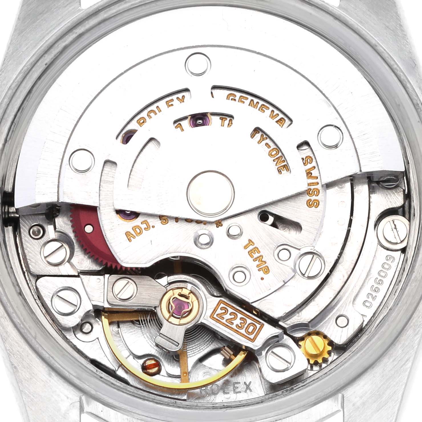 This image shows the movement mechanism of a Rolex Oyster Perpetual 76080 Women's Stainless Steel White Dial 76080 Women's Stainless Steel White Dial watch, focusing on the intricate gears and components inside.
