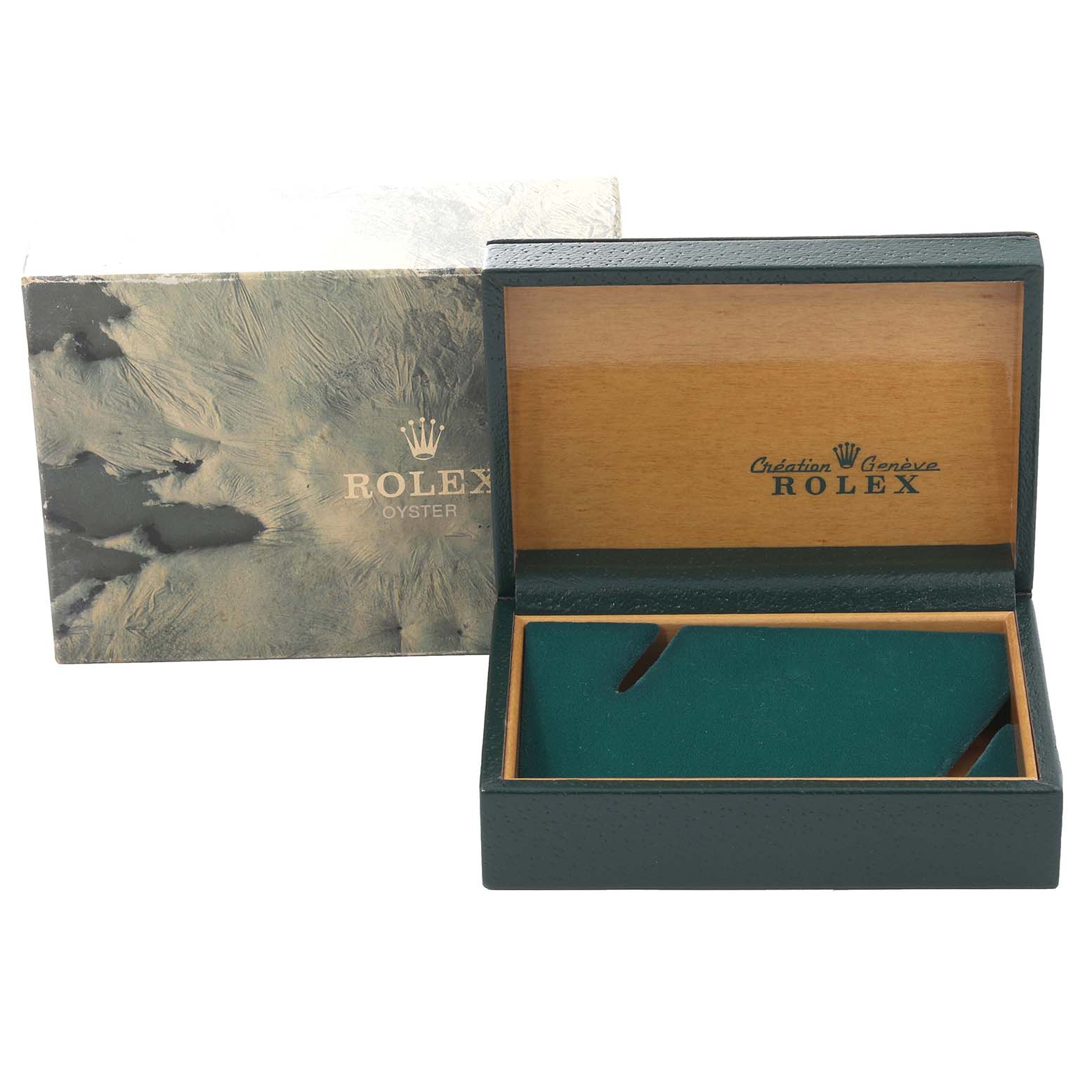 This image shows an open Rolex Vintage Collection 6694 Men's Stainless Steel Silver Dial 6694 Men's Stainless Steel Silver Dial watch box with an outer box behind it.
